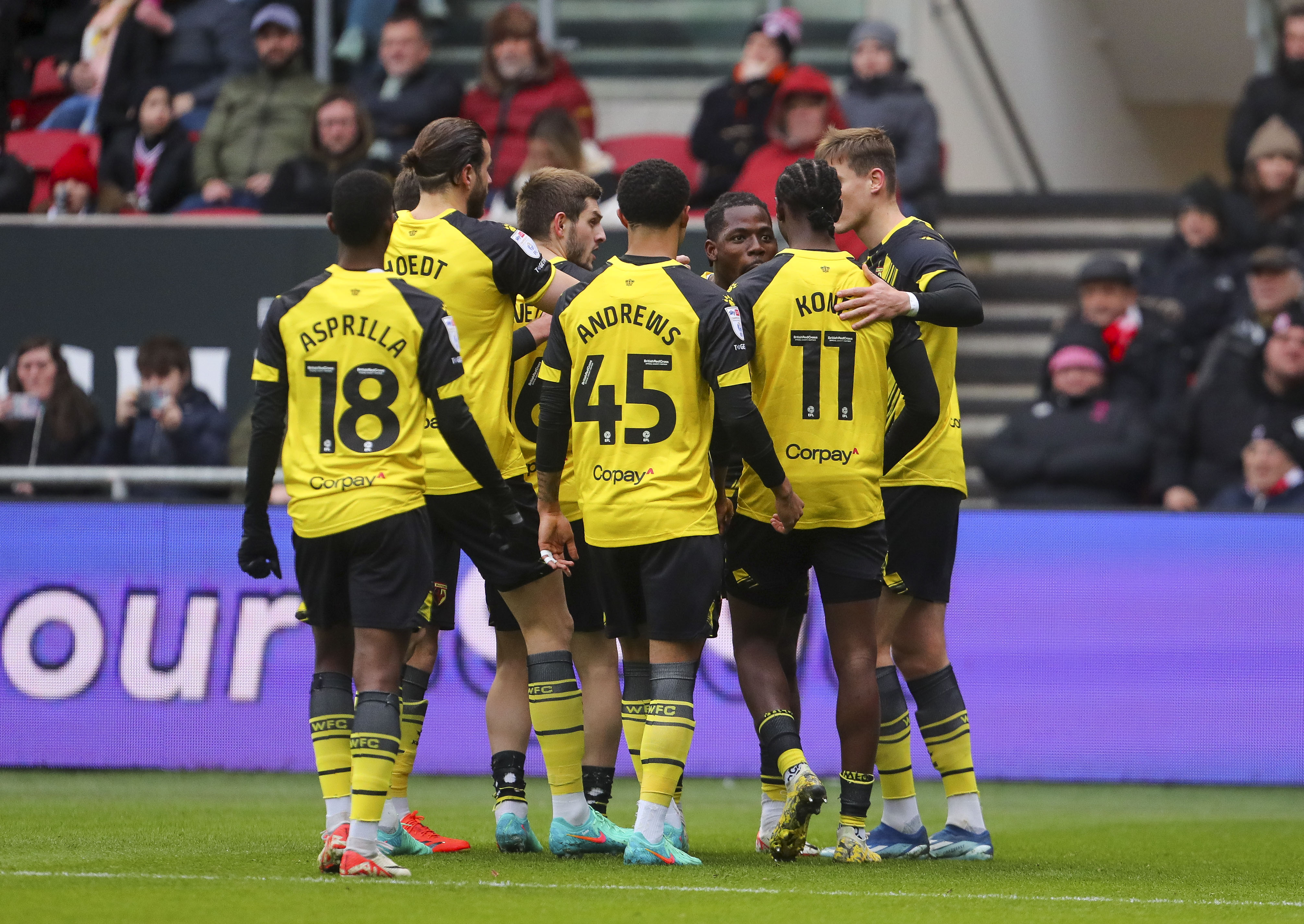 Several Watford players celebrate after scoring at Bristol City's Ashton Gate