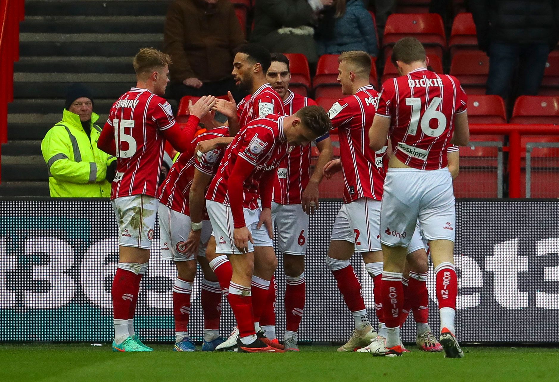 Several Bristol City players celebrate after their team scores a goal