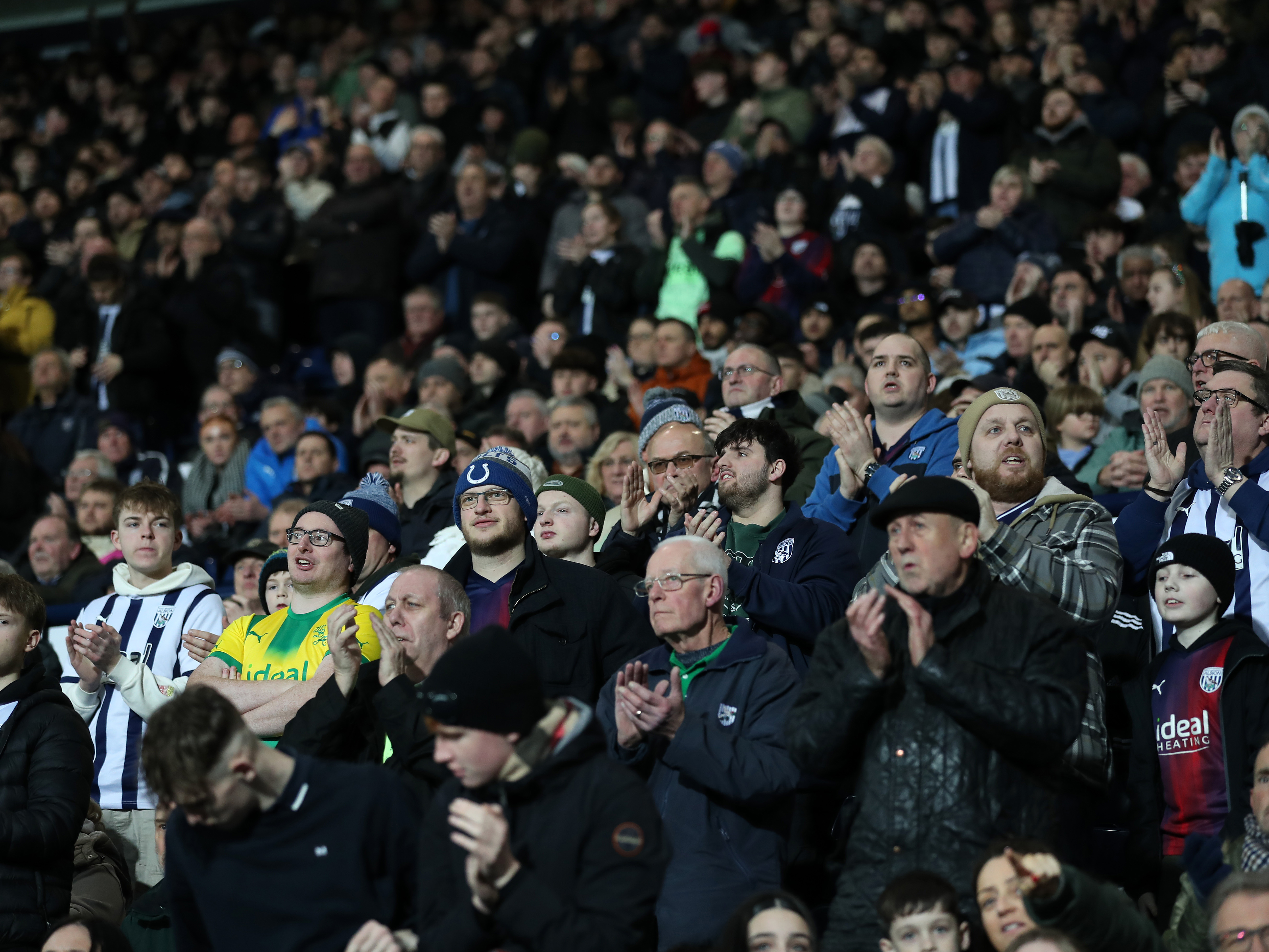 An image of West Bromwich Albion fans applauding at The Hawthorns