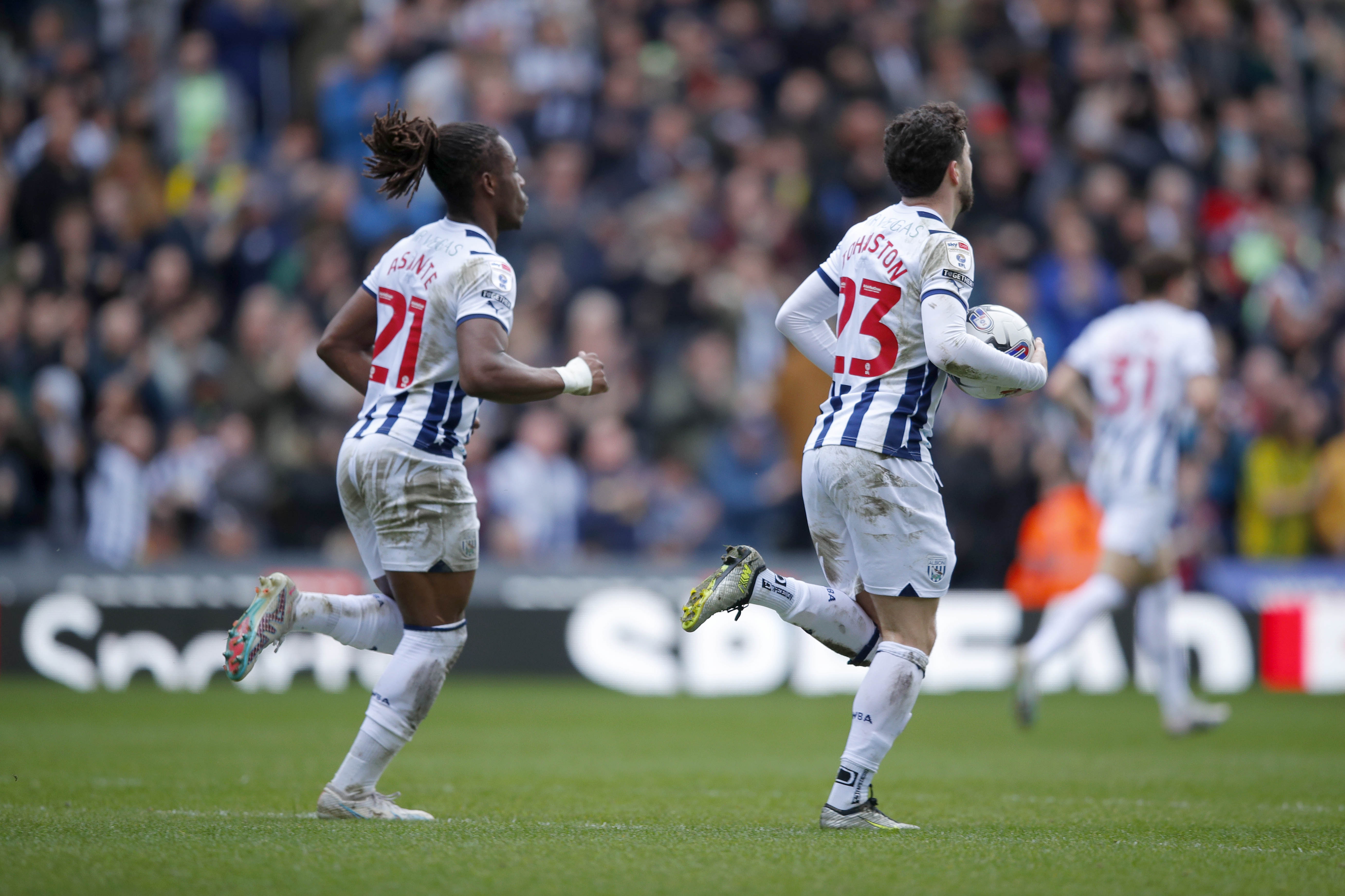 Brandon Thomas-Asante and Mikey Johnston run back into position after Brandon's goal against Watford 