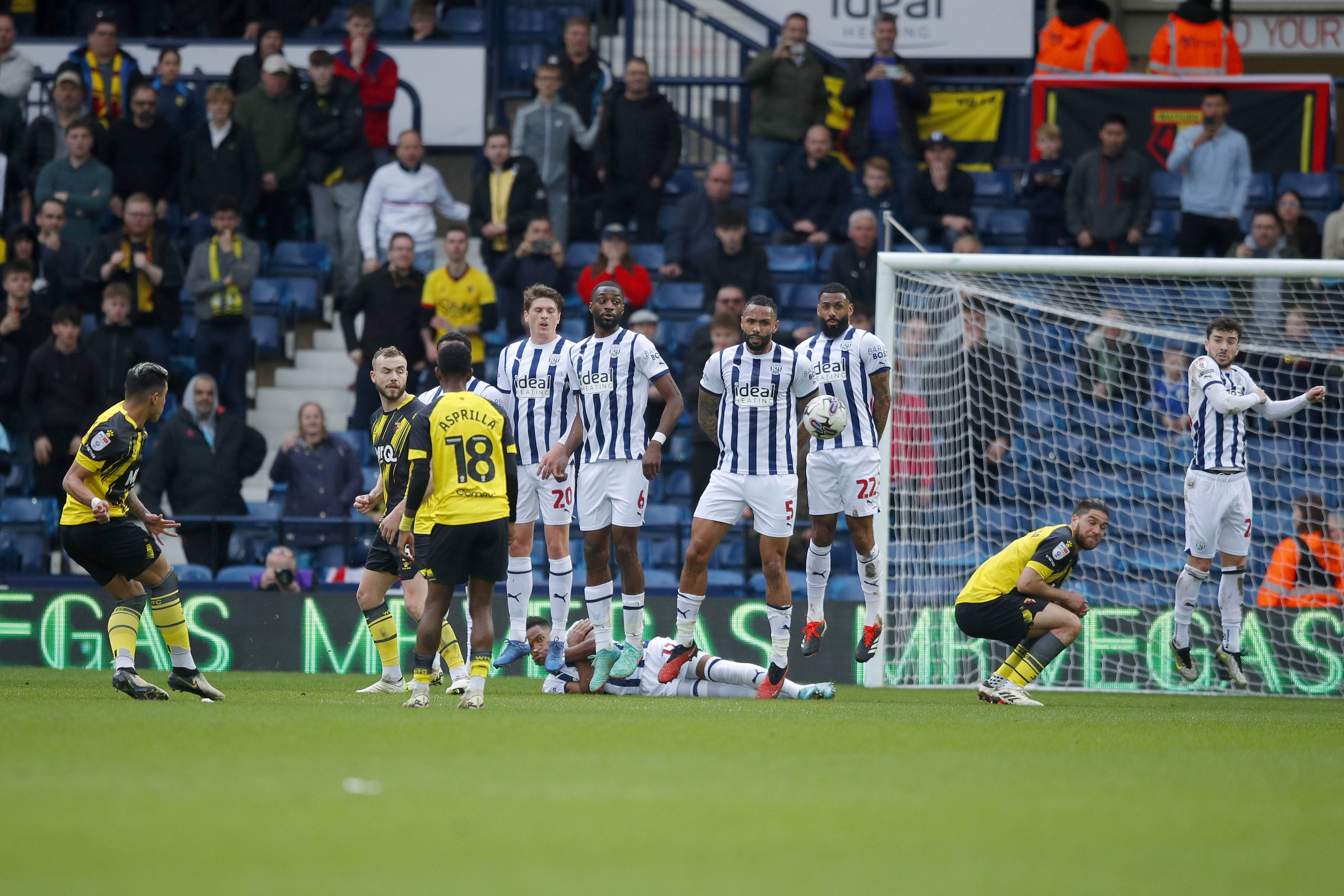 Albion players in a wall trying to block a Watford free-kick 