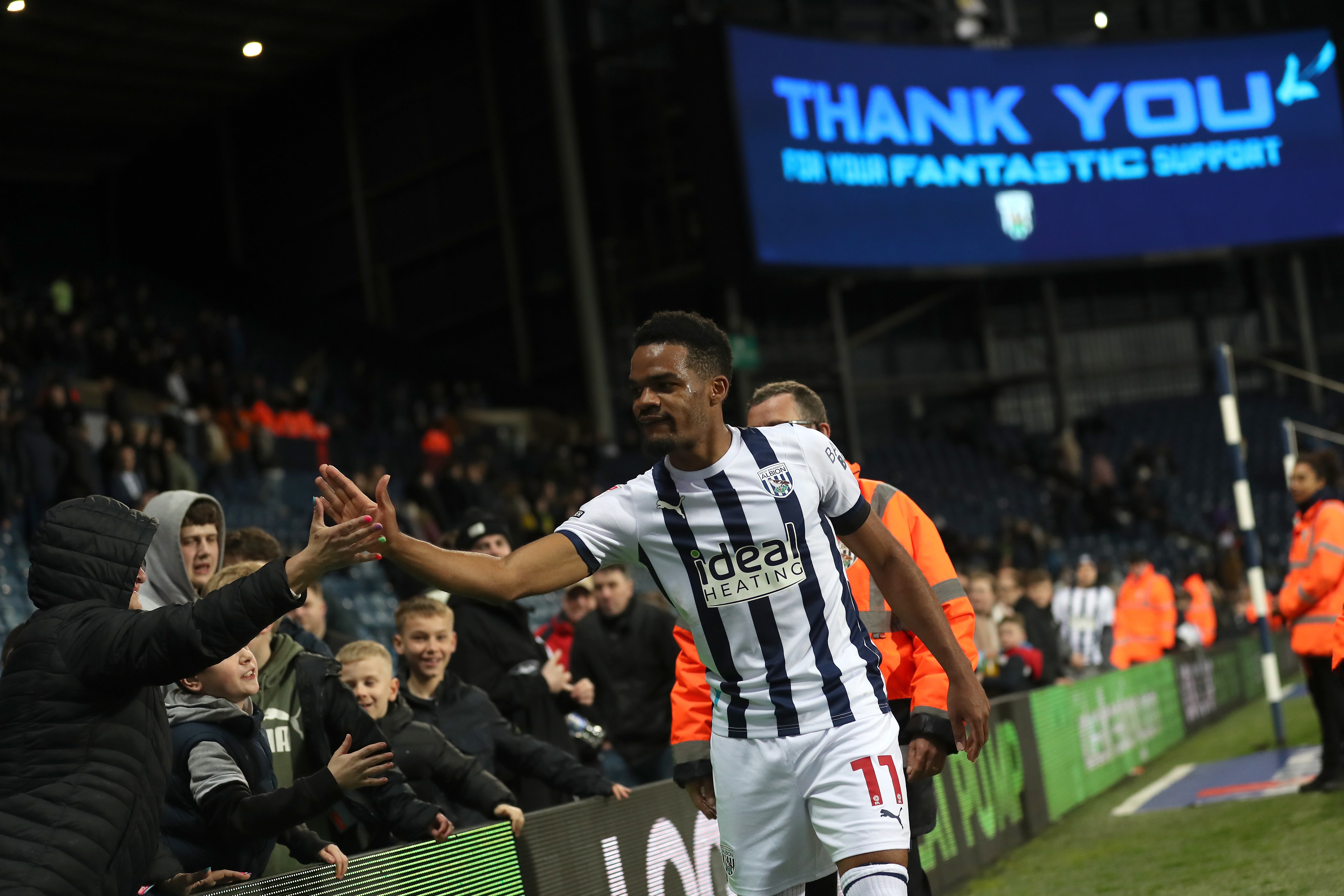 Grady Diangana greeting fans after beating Rotherham 