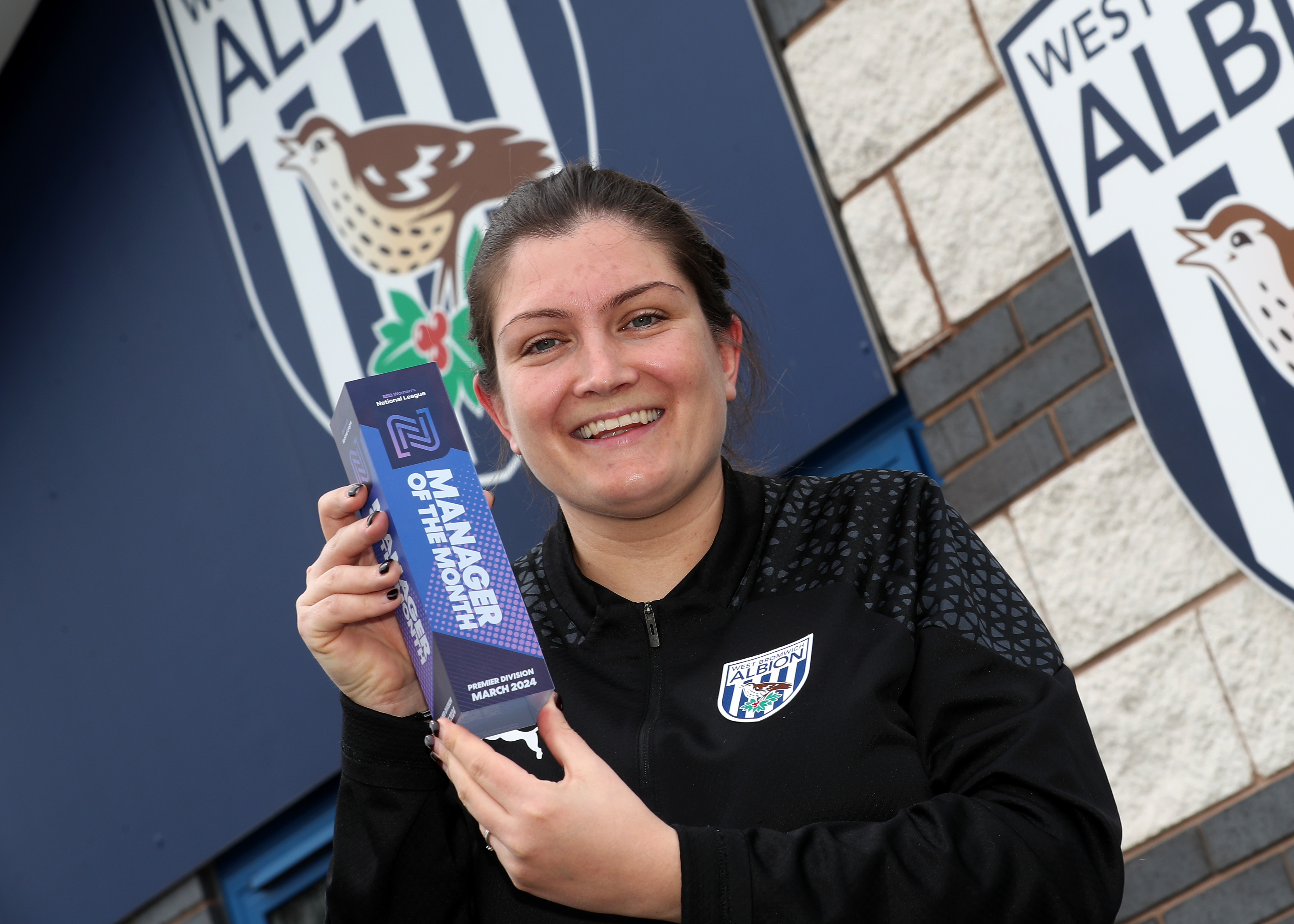Siobhan Hodgetts-Still with her Manager of the Month award.