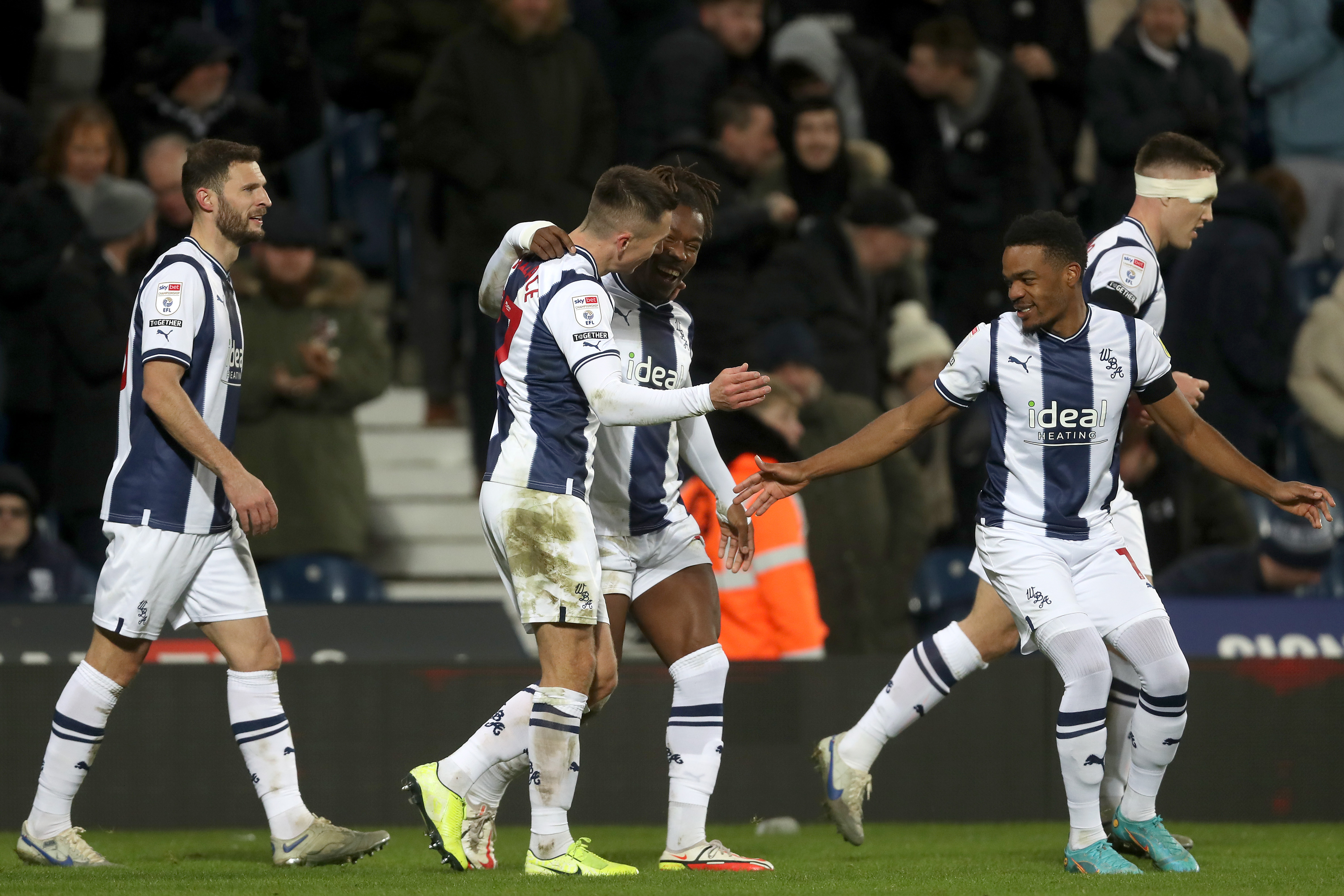 Albion players celebrate with Brandon Thomas-Asante after his goal against Rotherham at The Hawthorns in December 2022
