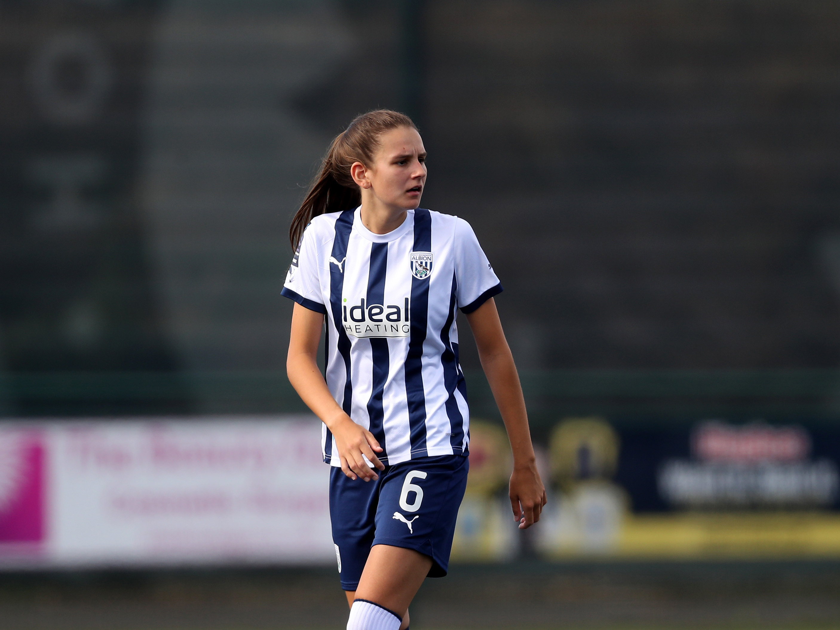 Izzy Green in action for WBA Women in the home kit