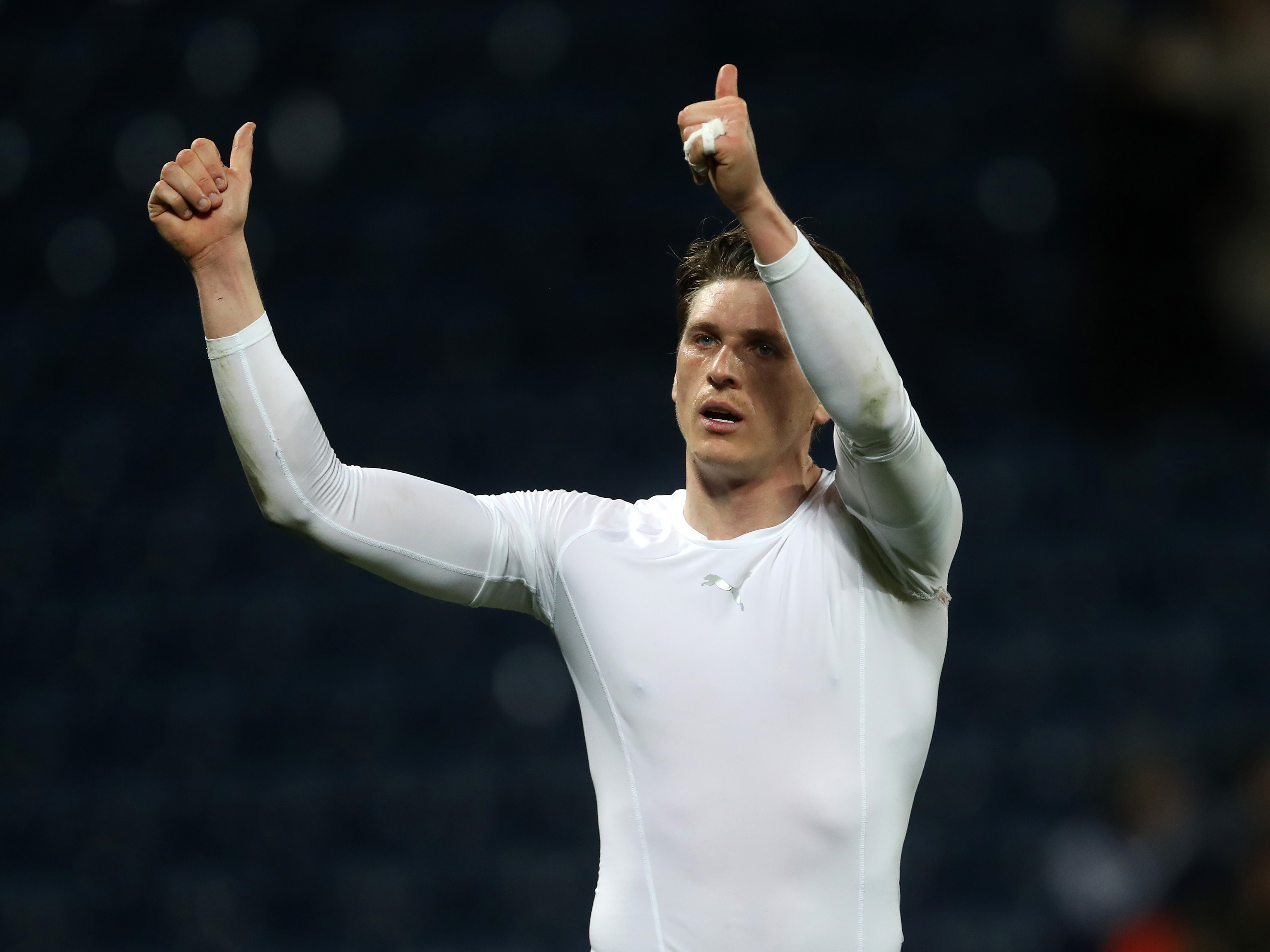 Adam Reach puts his thumbs up to Albion fans at The Hawthorns