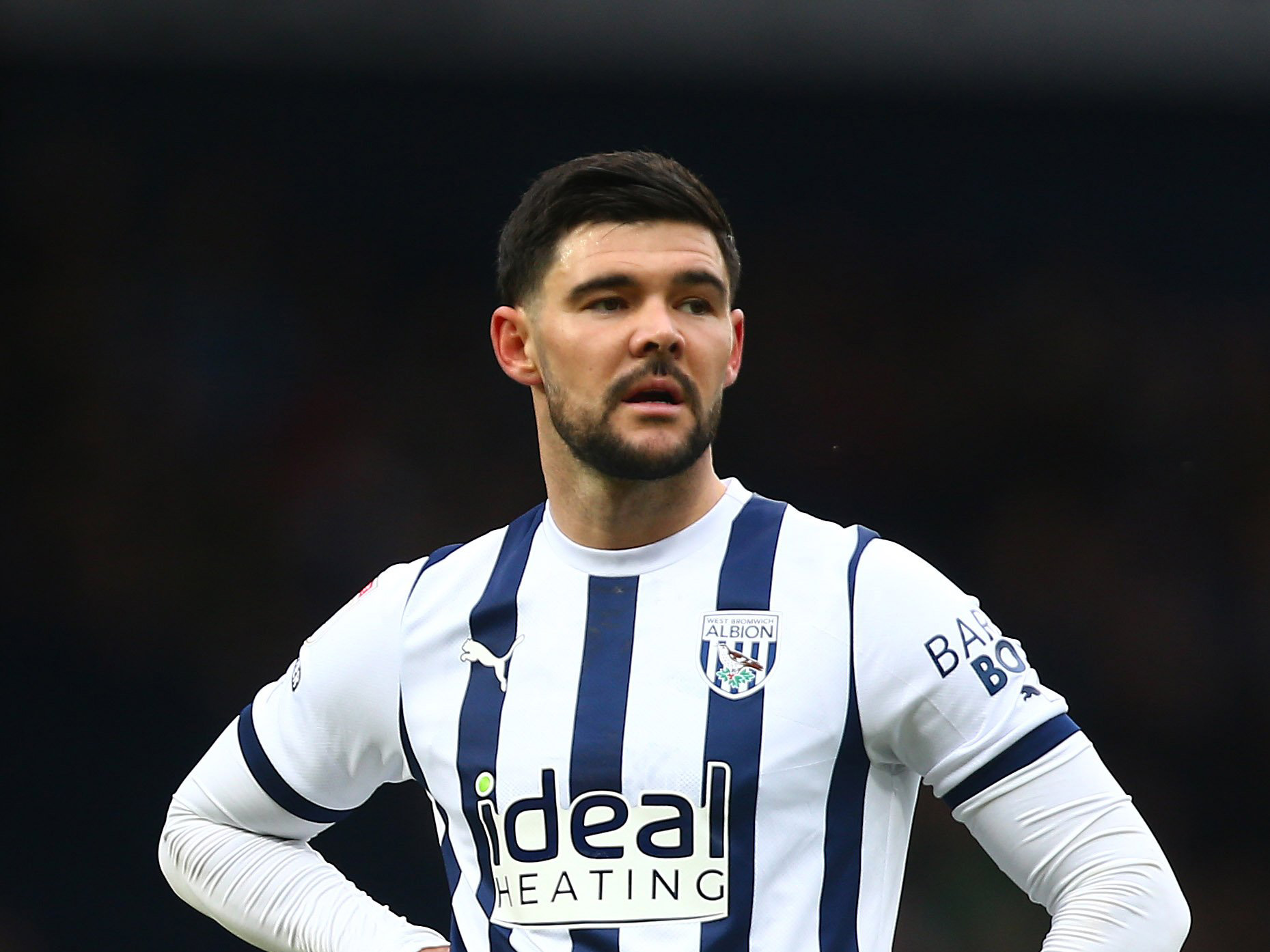 Alex Mowatt in action for Albion wearing the home kit 