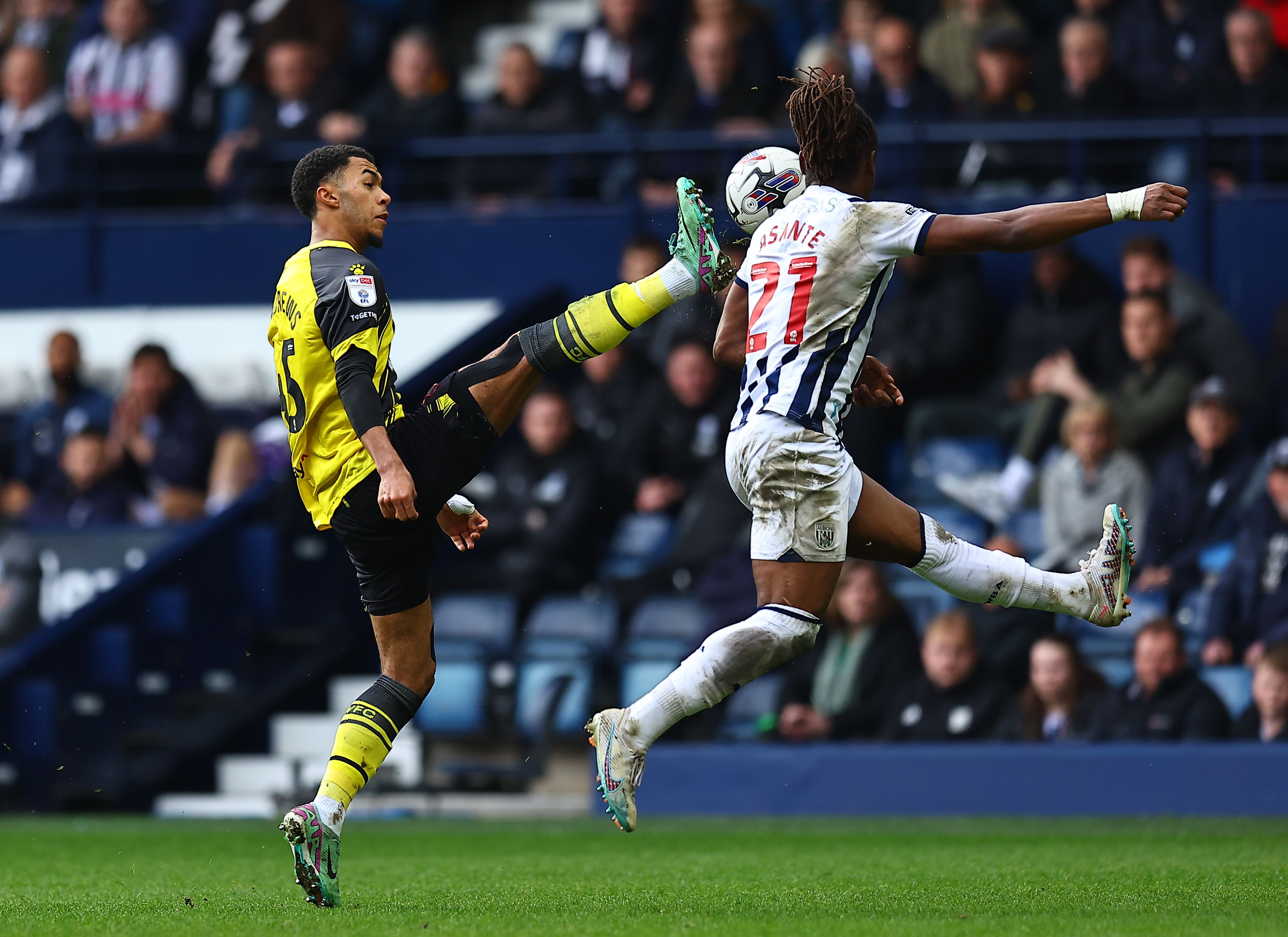 Brandon Thomas-Asante jumps for the ball against Watford 