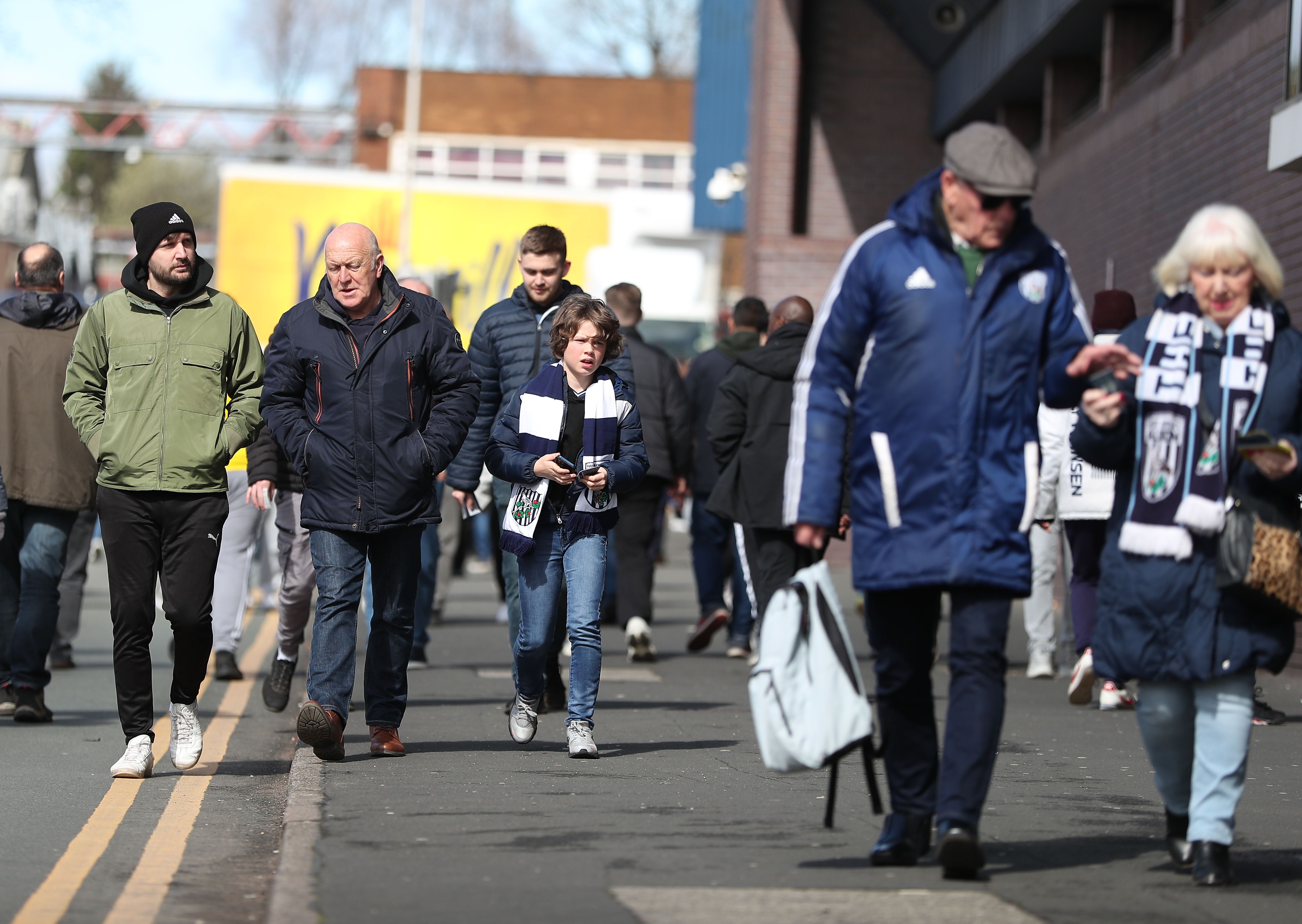 Albion fans walking on Halfords Lane before a game