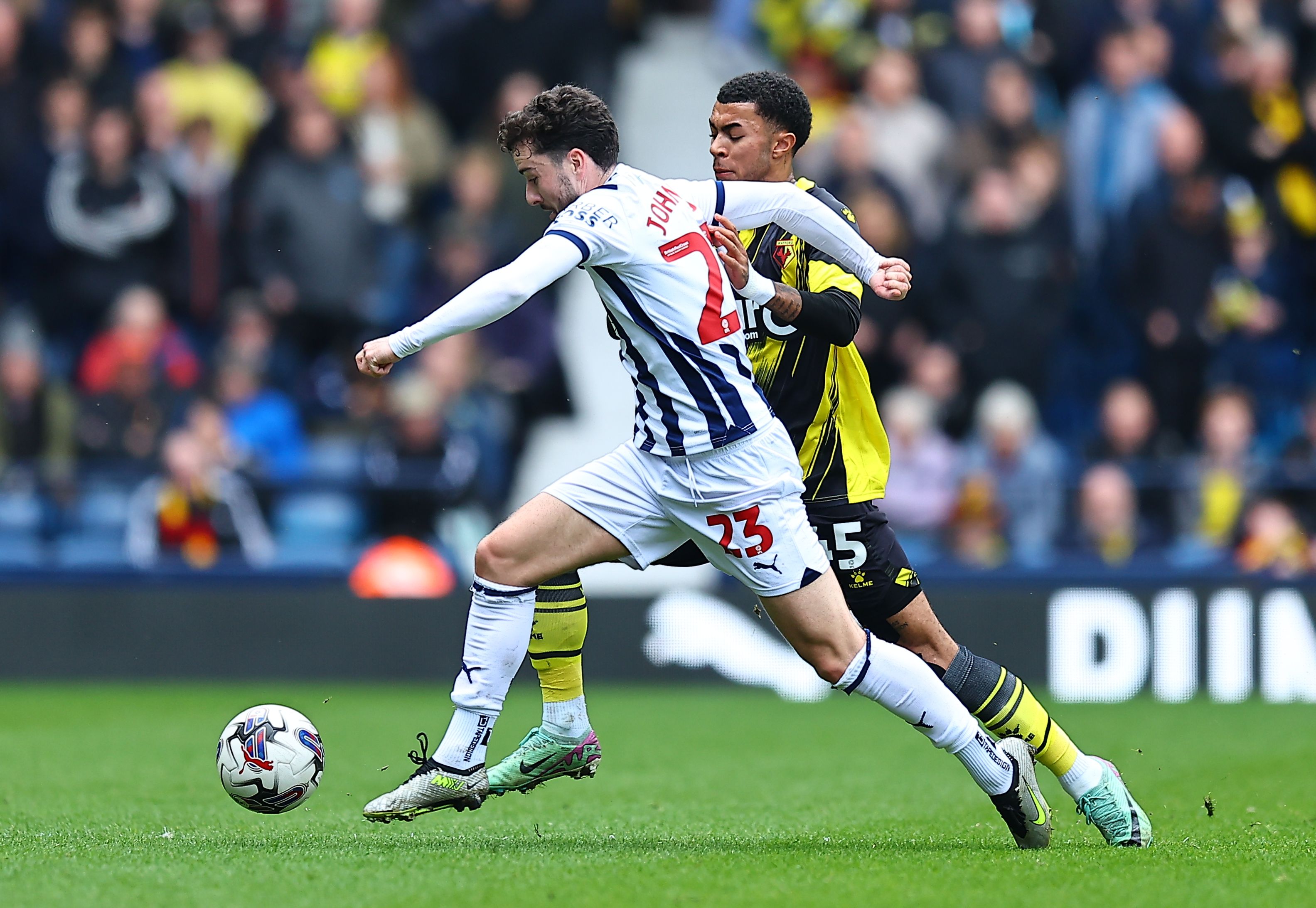 Mikey Johnston running with the ball against Watford 