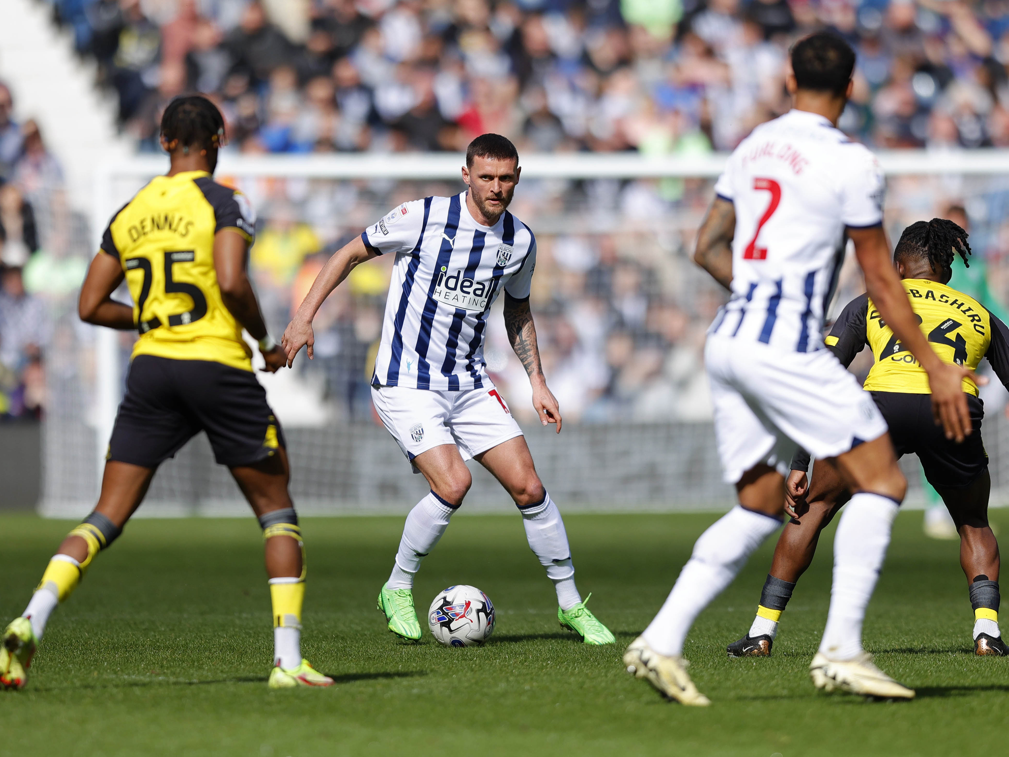An image of John Swift on the ball against Watford