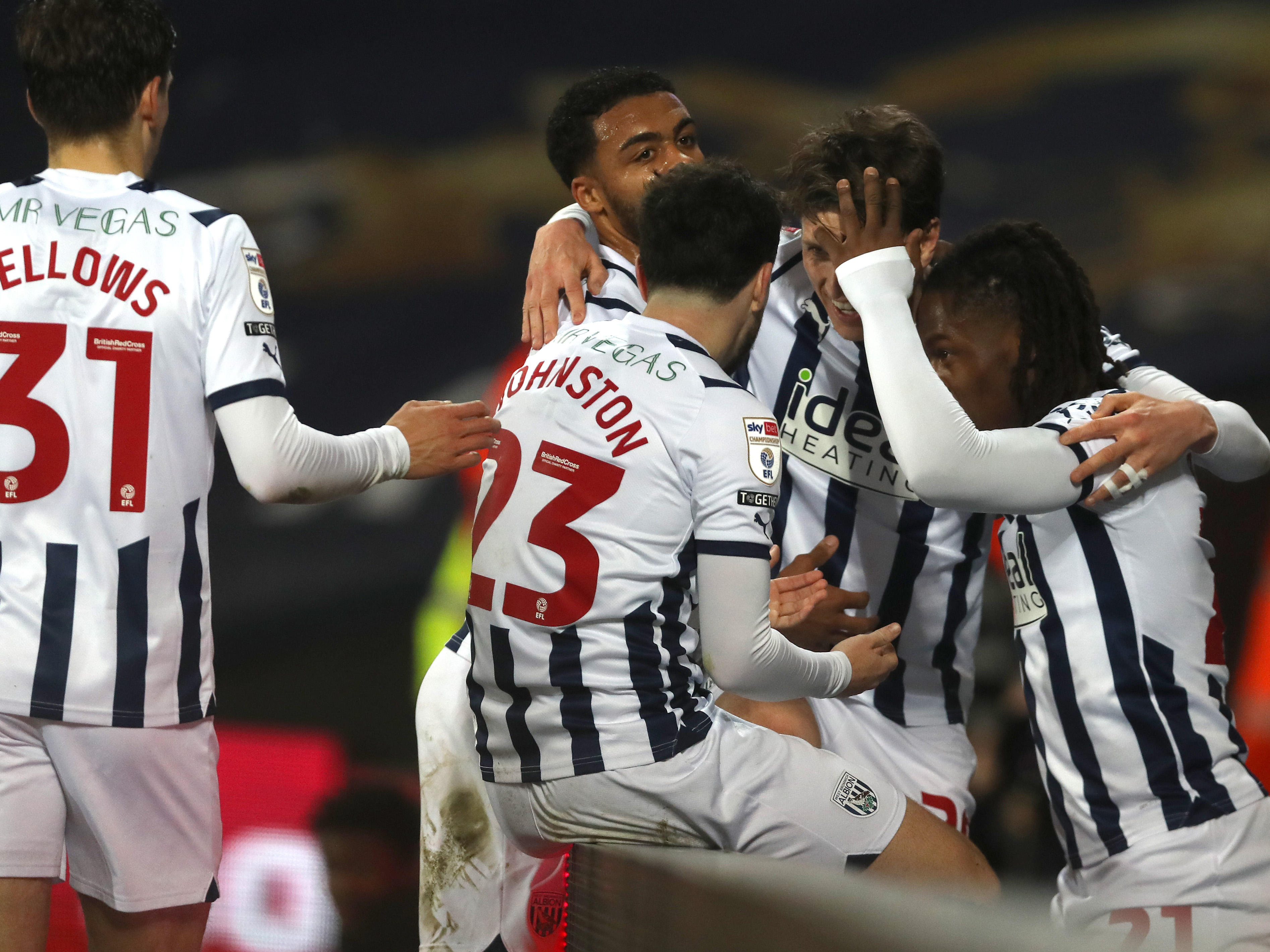 An image of Brandon Thomas-Asante celebrating with his teammates after scoring against Rotherham