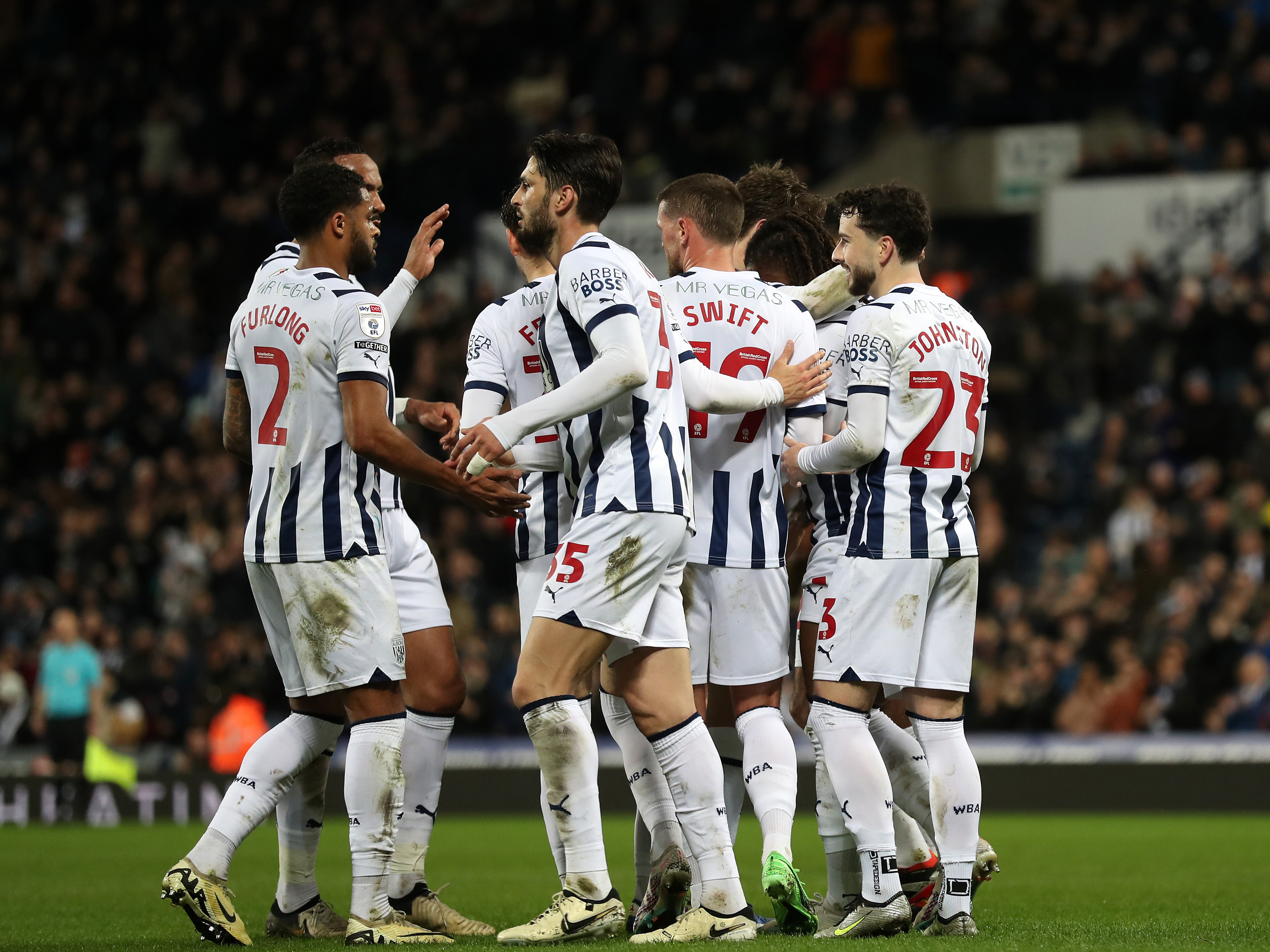 An image of John Swift celebrating with his teammates after scoring against Rotherham