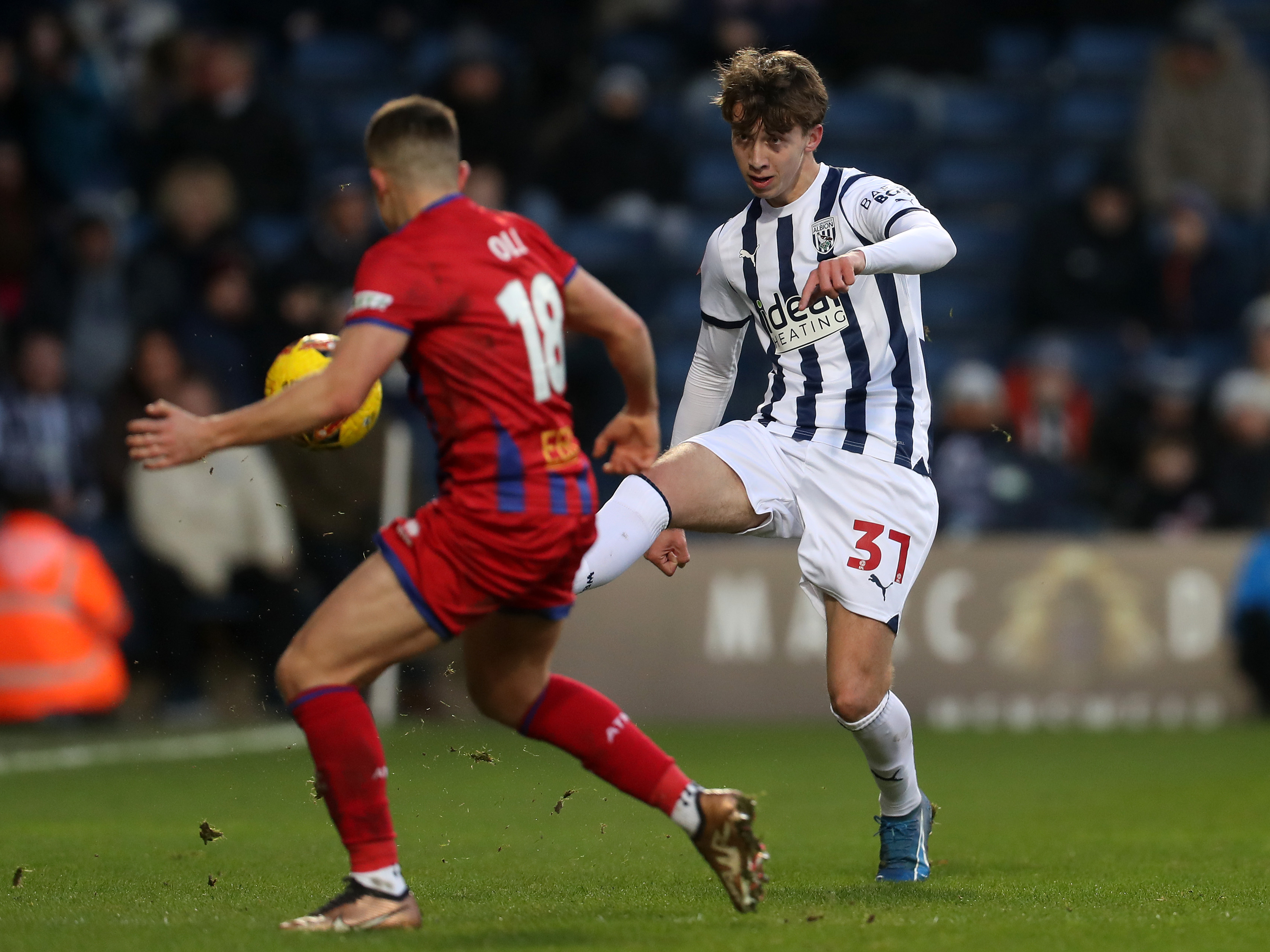 A photo of Harry Whitwell, in the 23/24 home kit, in action for Albion in the FA Cup v Alderhsot