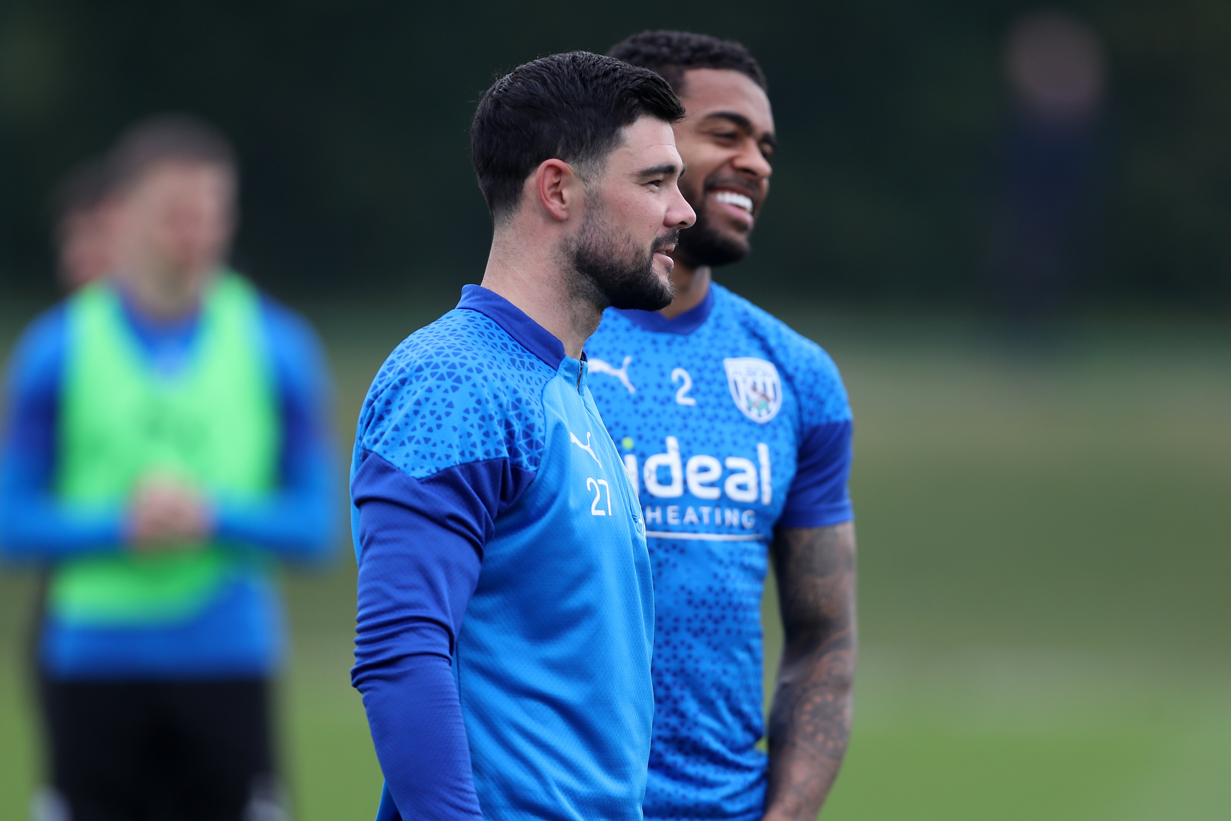 Alex Mowatt and Darnell Furlong smiling during a training session