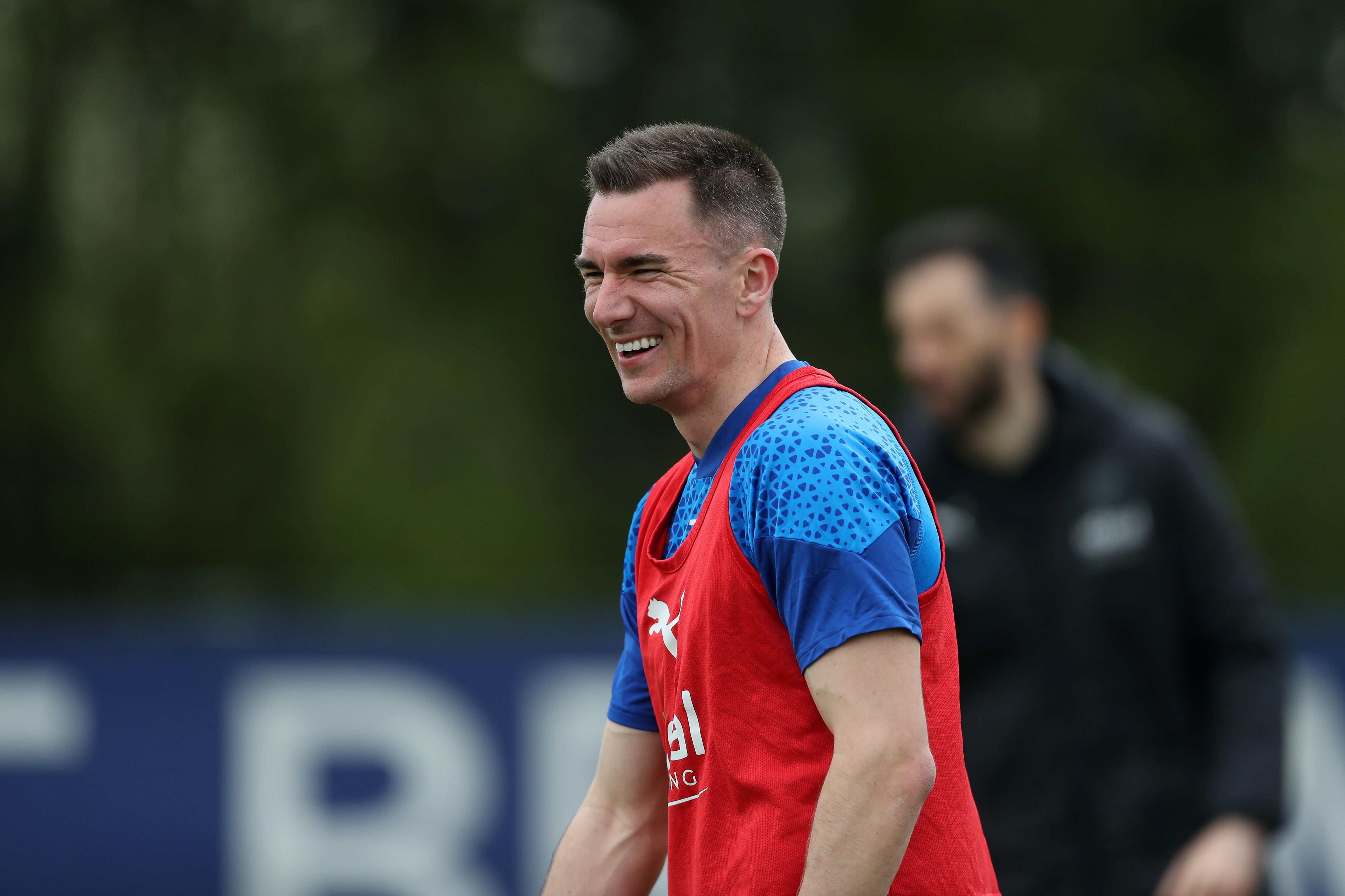 Jed Wallace smiling during a training session