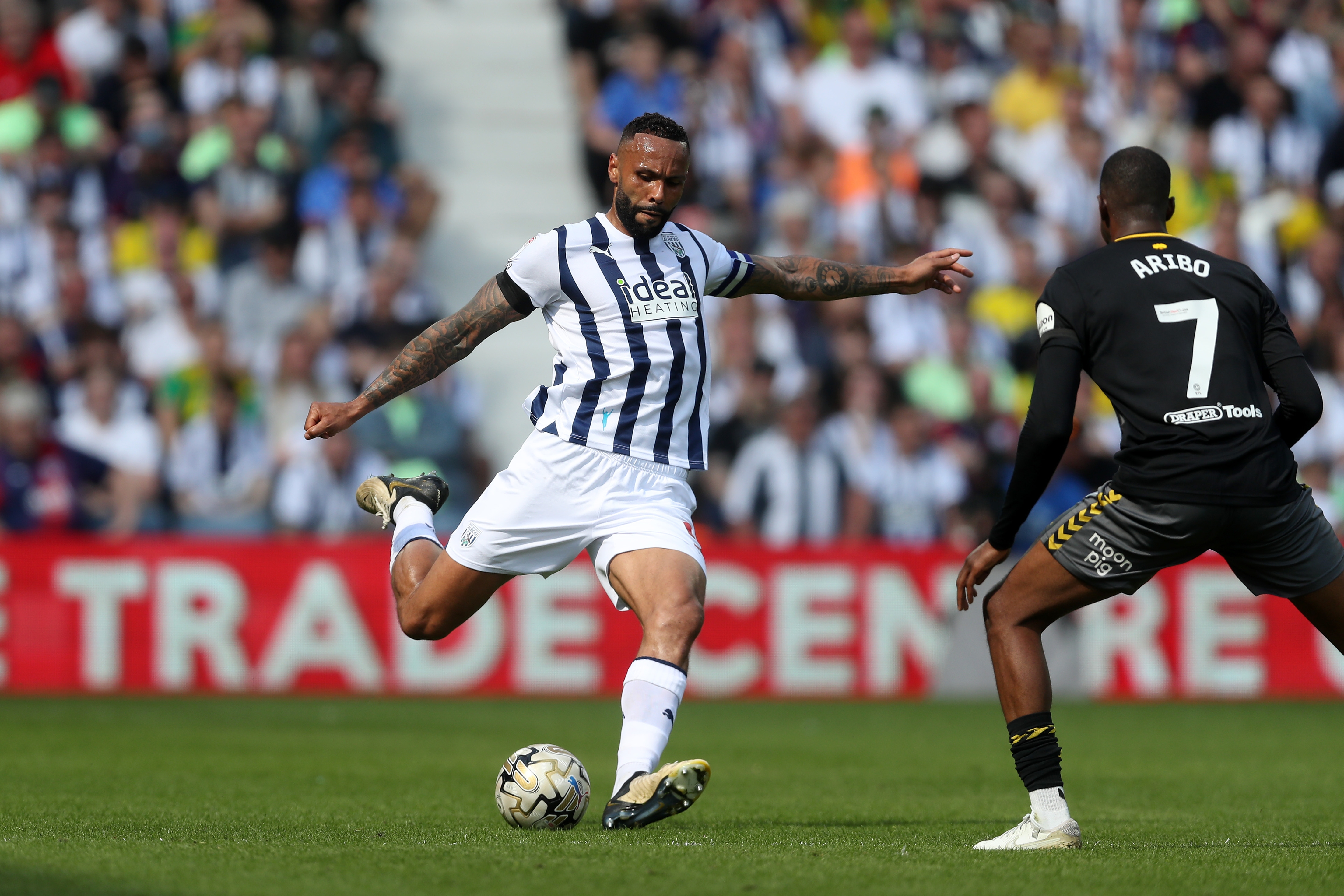 Kyle Bartley striking the ball at The Hawthorns against Southampton 