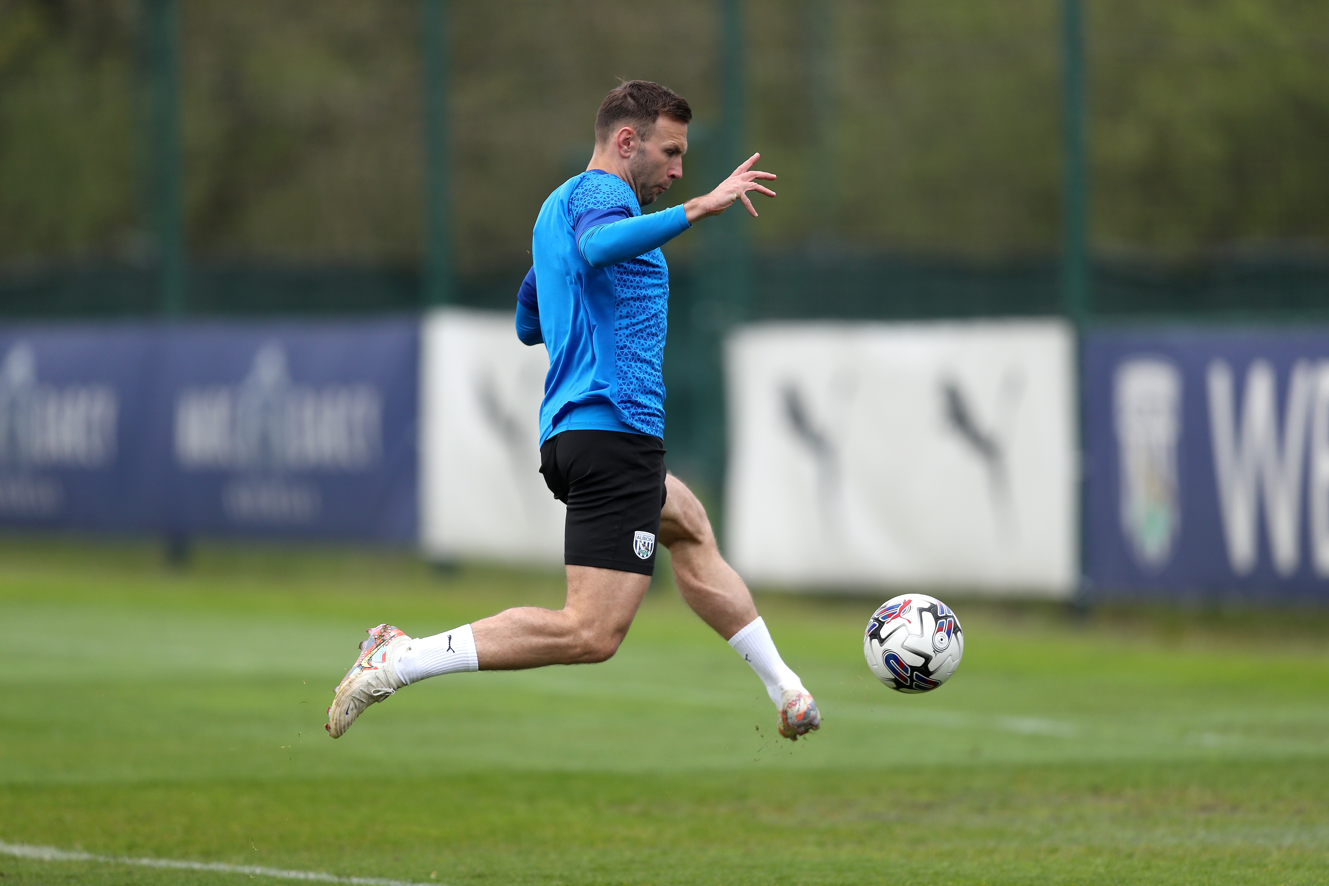 Andi Weimann volleying the ball during a training session 