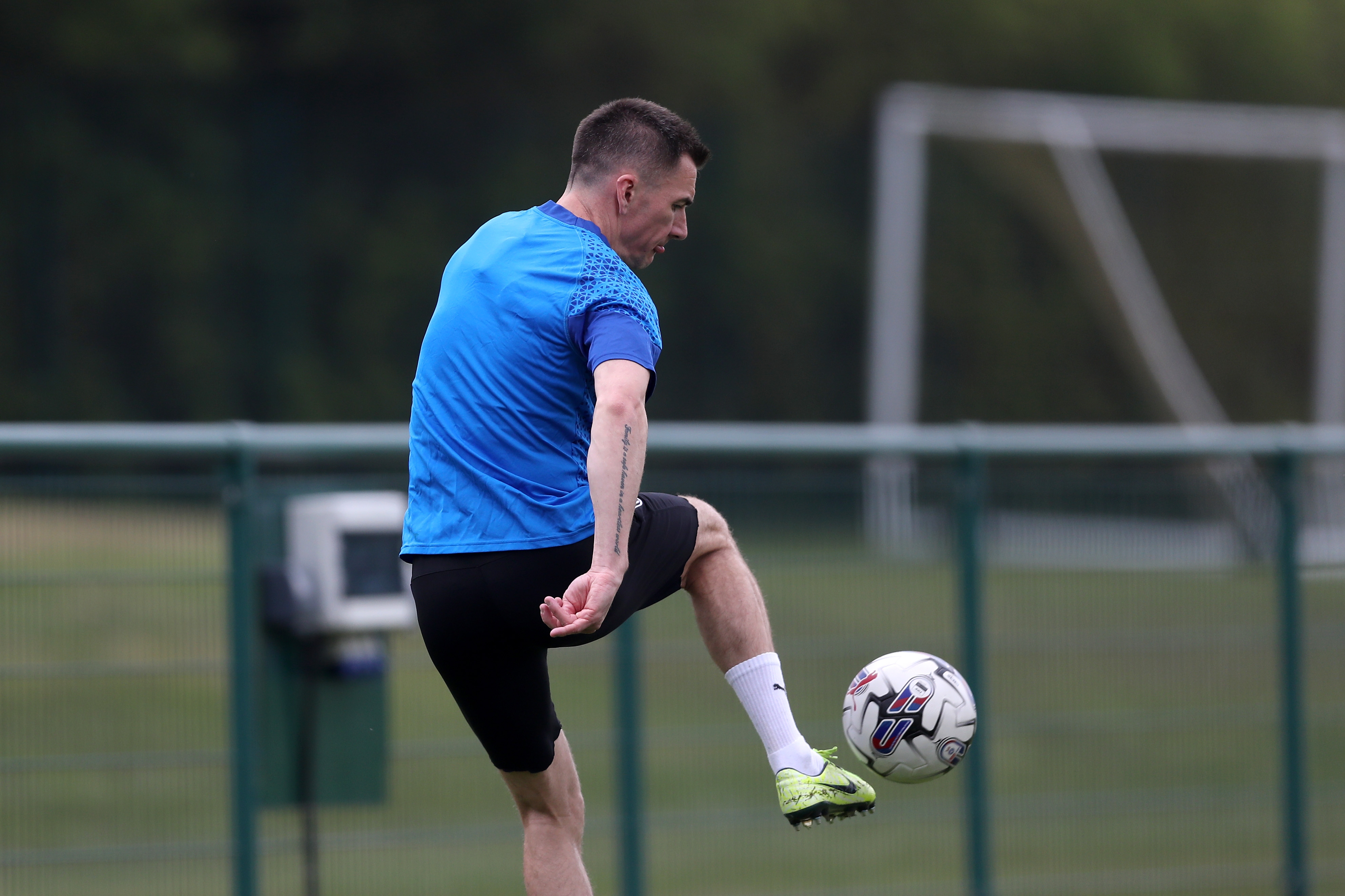 Jed Wallace controlling the ball during a training session