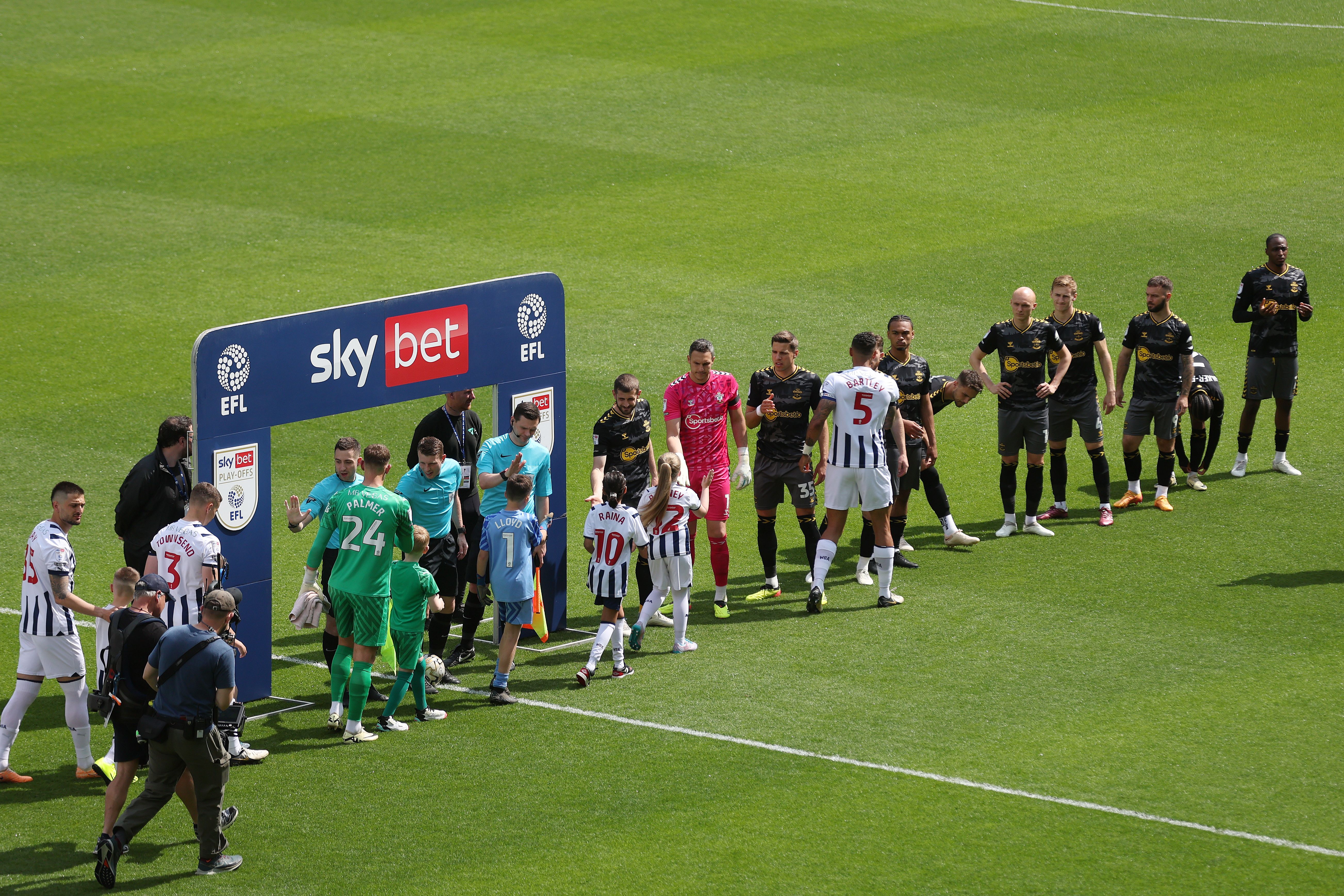 West Bromwich Albion players shake hands with the Southampton players for the play-off match at The Hawthorns 