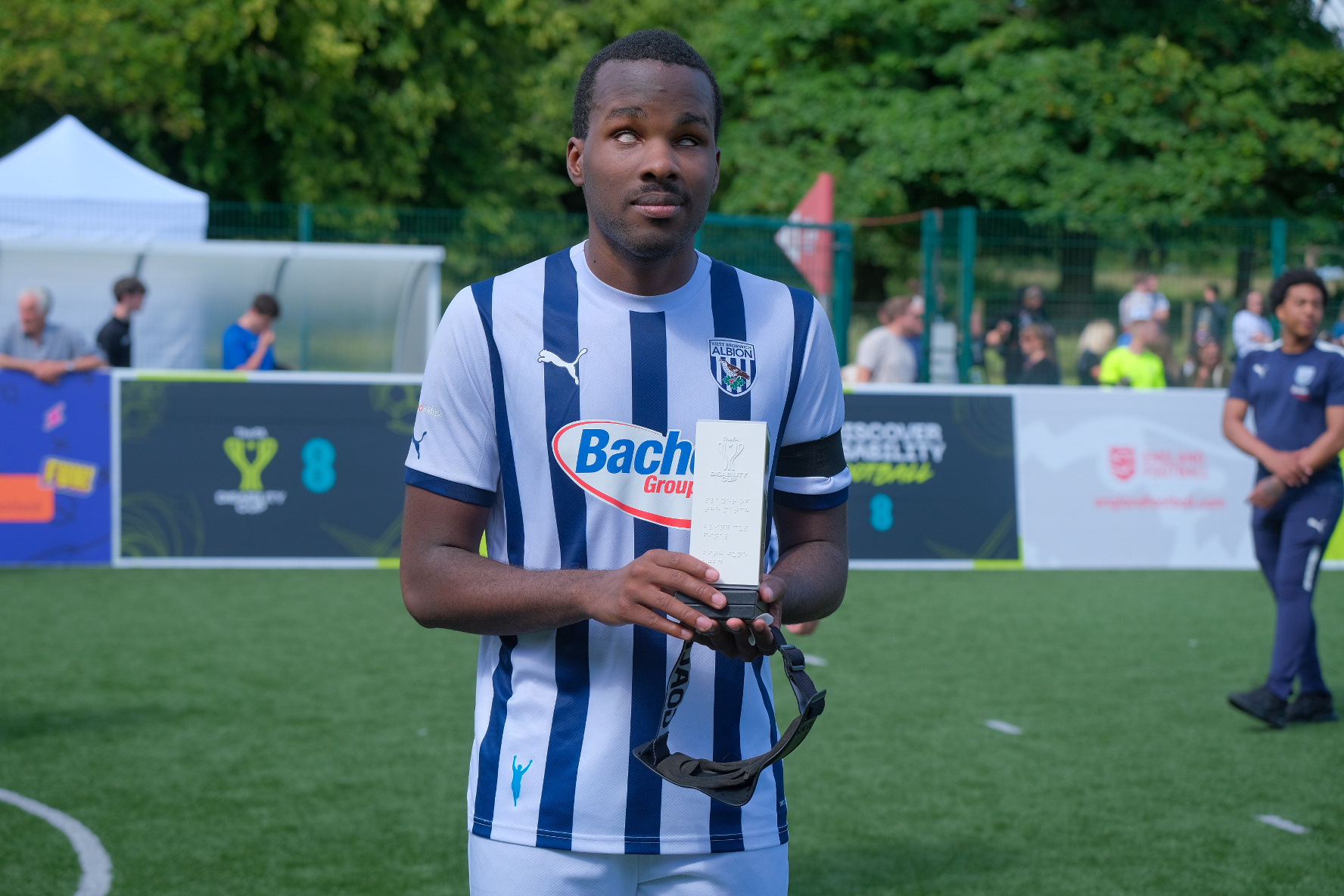 Paul Iyobo with the FA Disability Cup Player of the Match trophy.