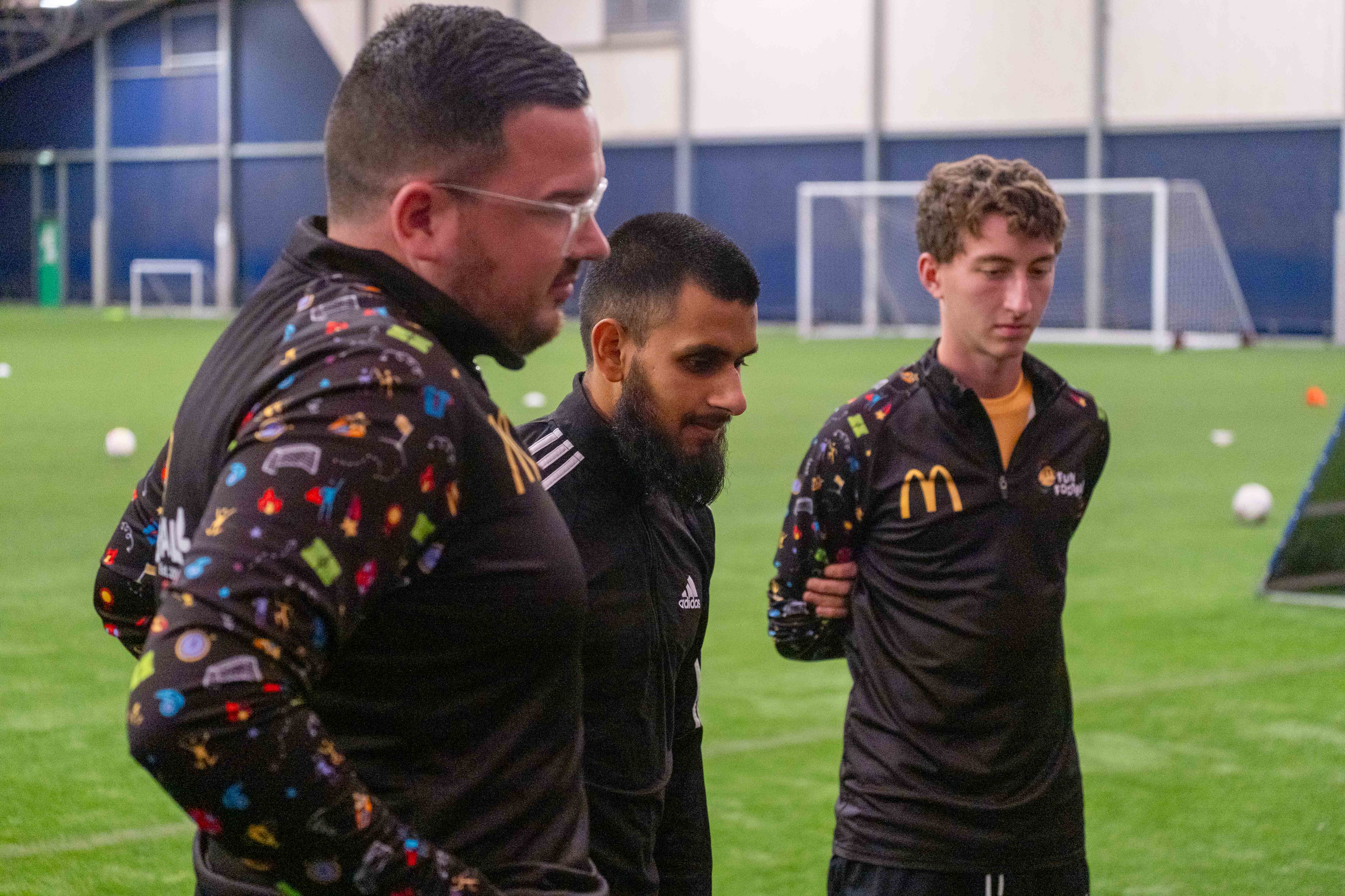 Eesa Amjid takes questions from youngsters during their McDonald's Fun Football Session.