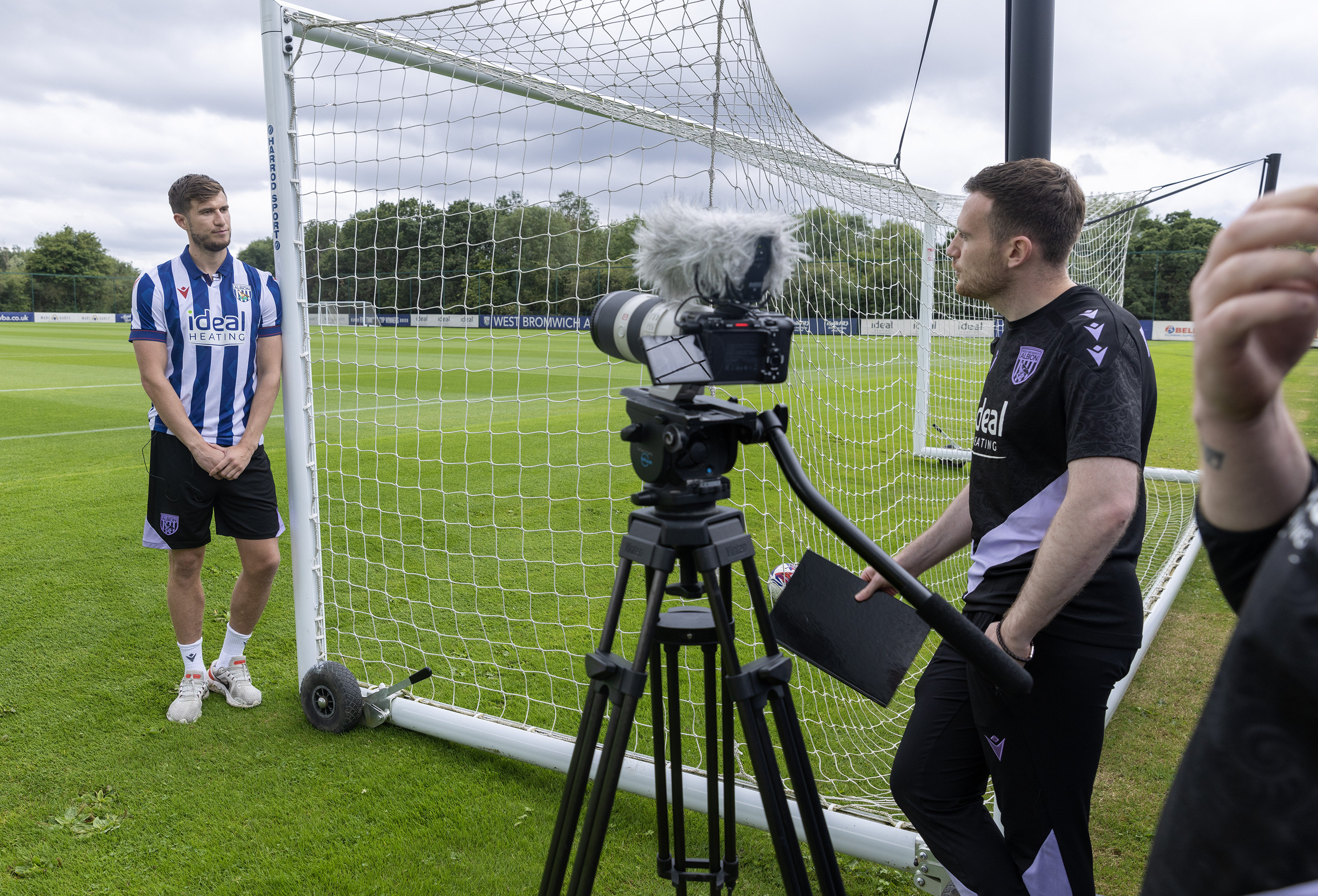 Paddy McNair is interviewed by WBA TV while stood up against a goal post 