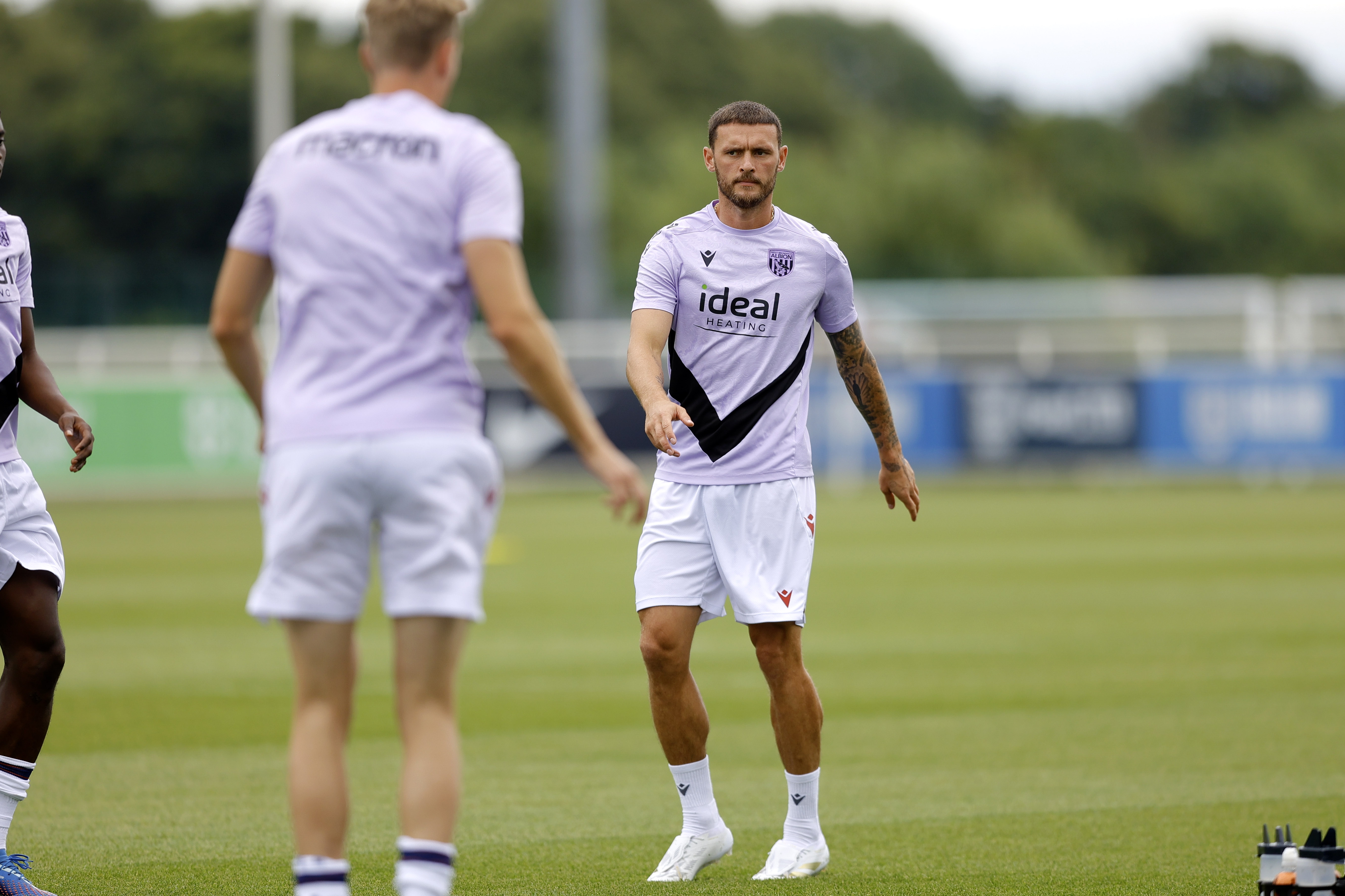 An image of John Swift warming up for Albion's friendly against Peterborough