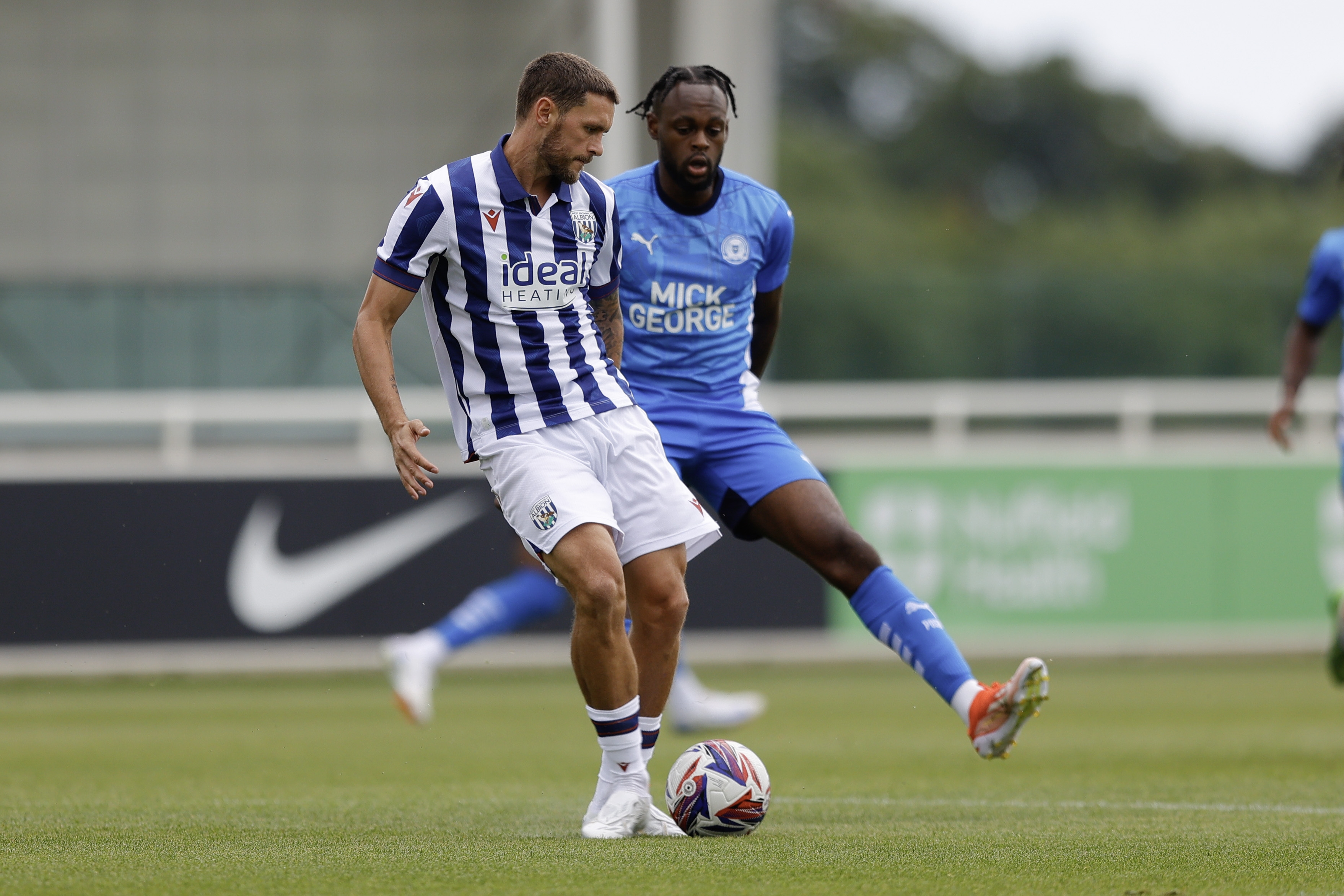 An image of John Swift on the ball during Albion's friendly against Peterborough