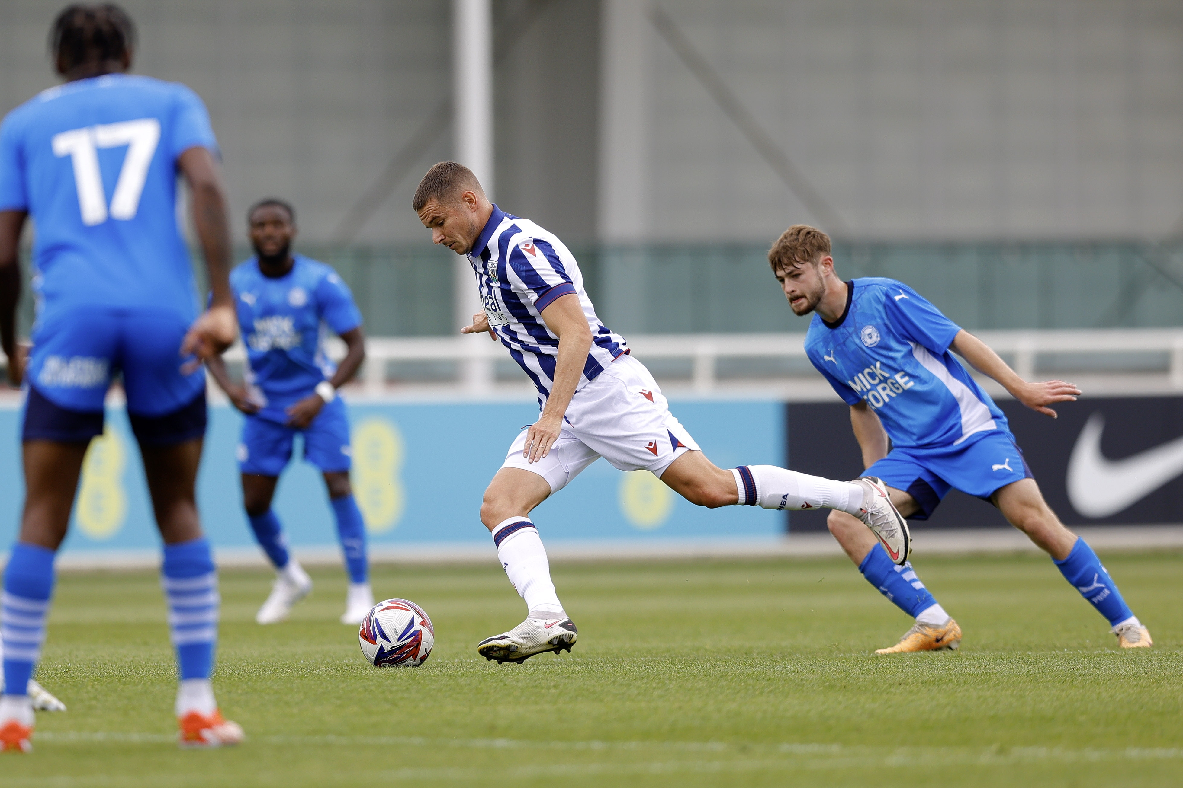 An image of Conor Townsend on the ball during Albion's friendly against Peterborough