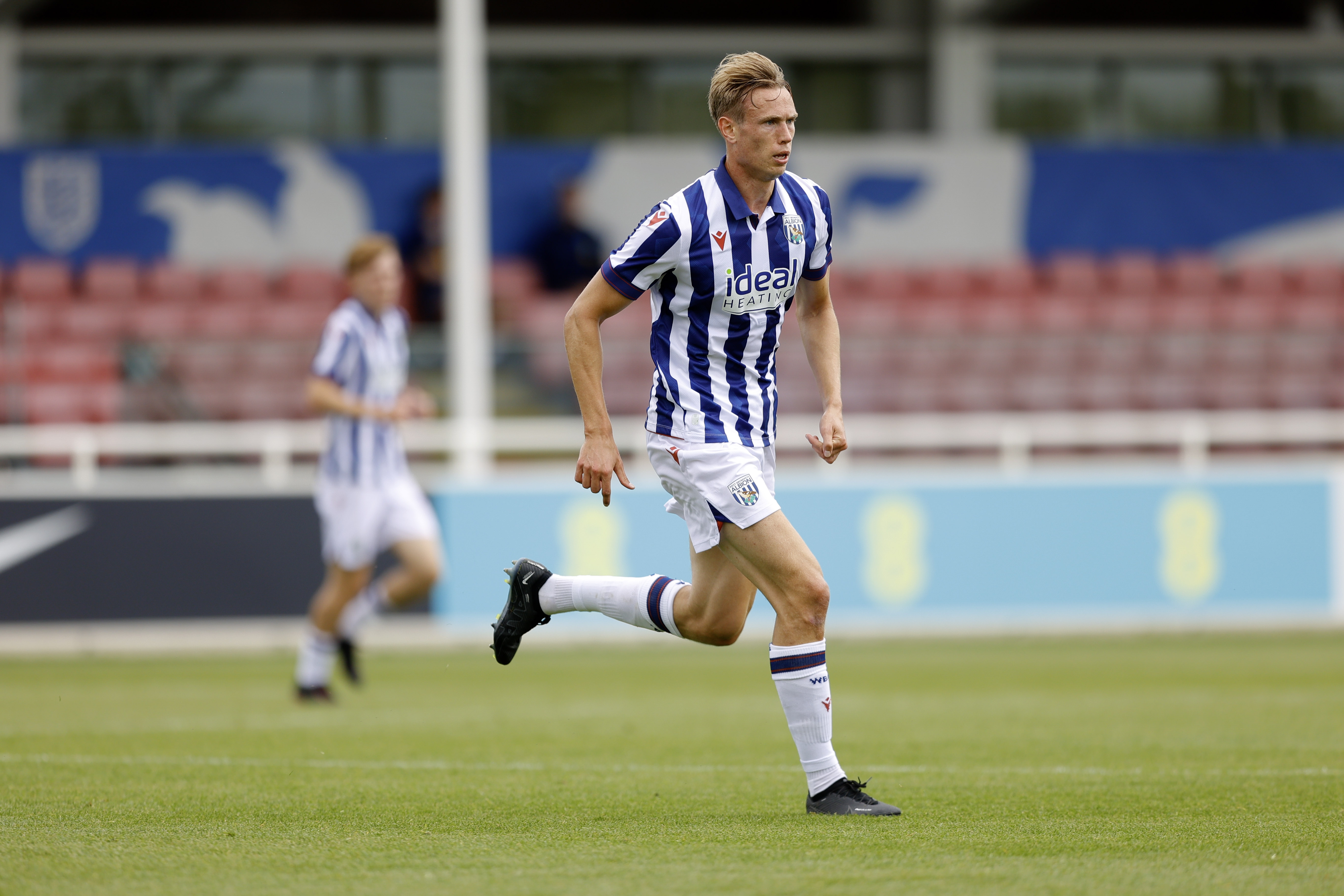 An image of Torbjorn Heggem running during Albion's friendly against Peterborough