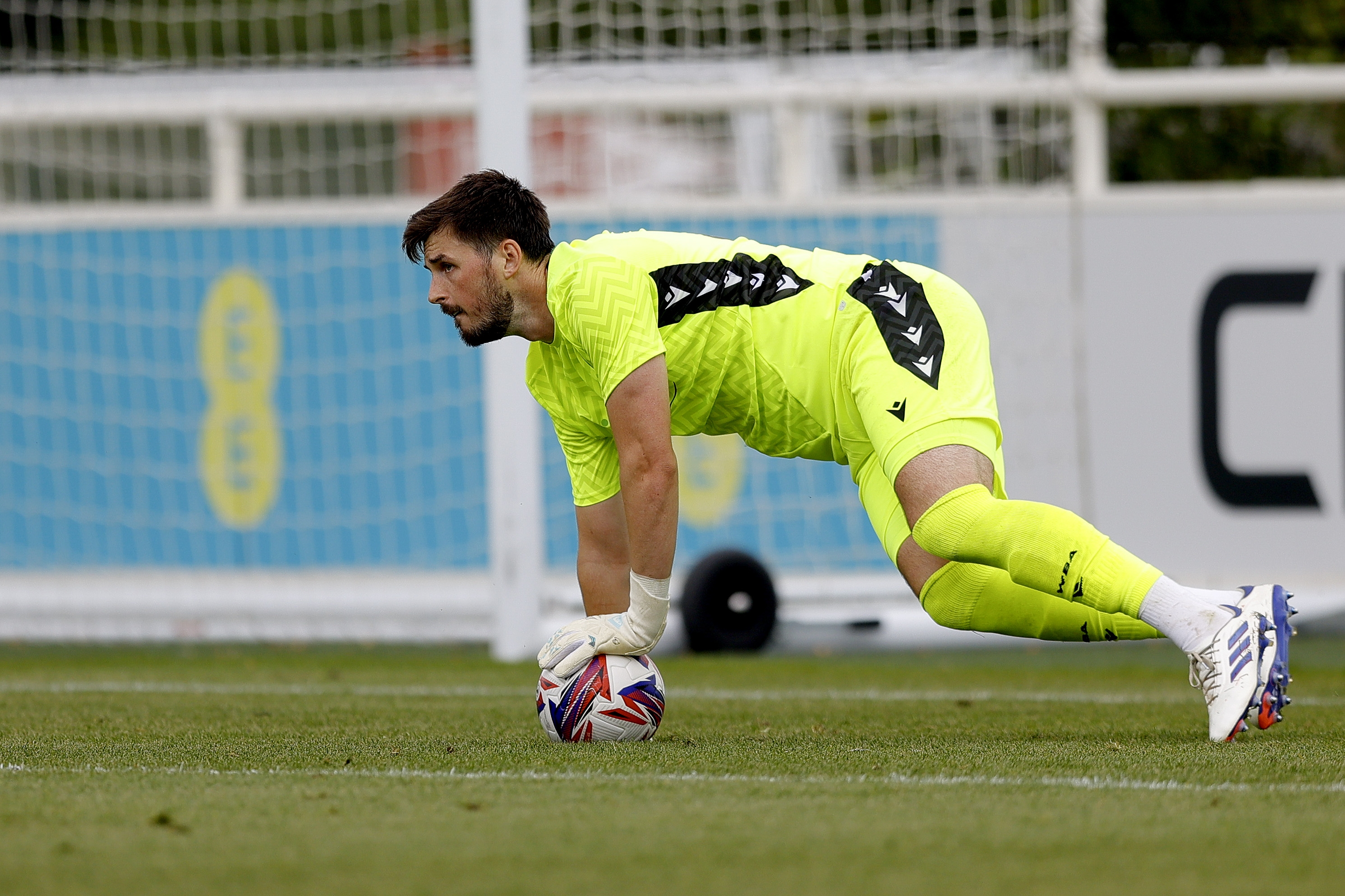 An image of Joe Wildsmith on the ball during Albion's friendly against Peterborough