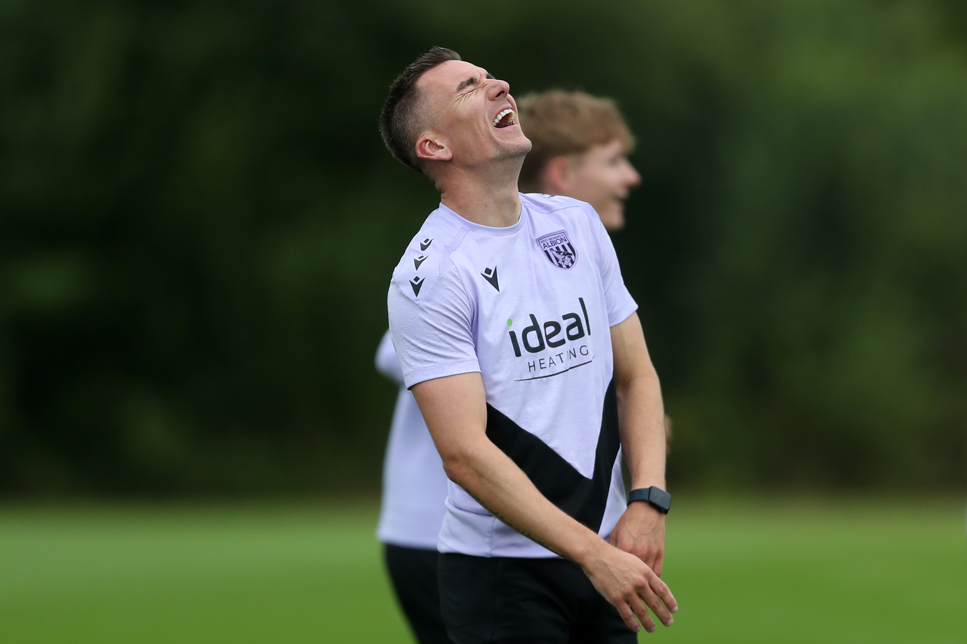 Jed Wallace laughing during a training session