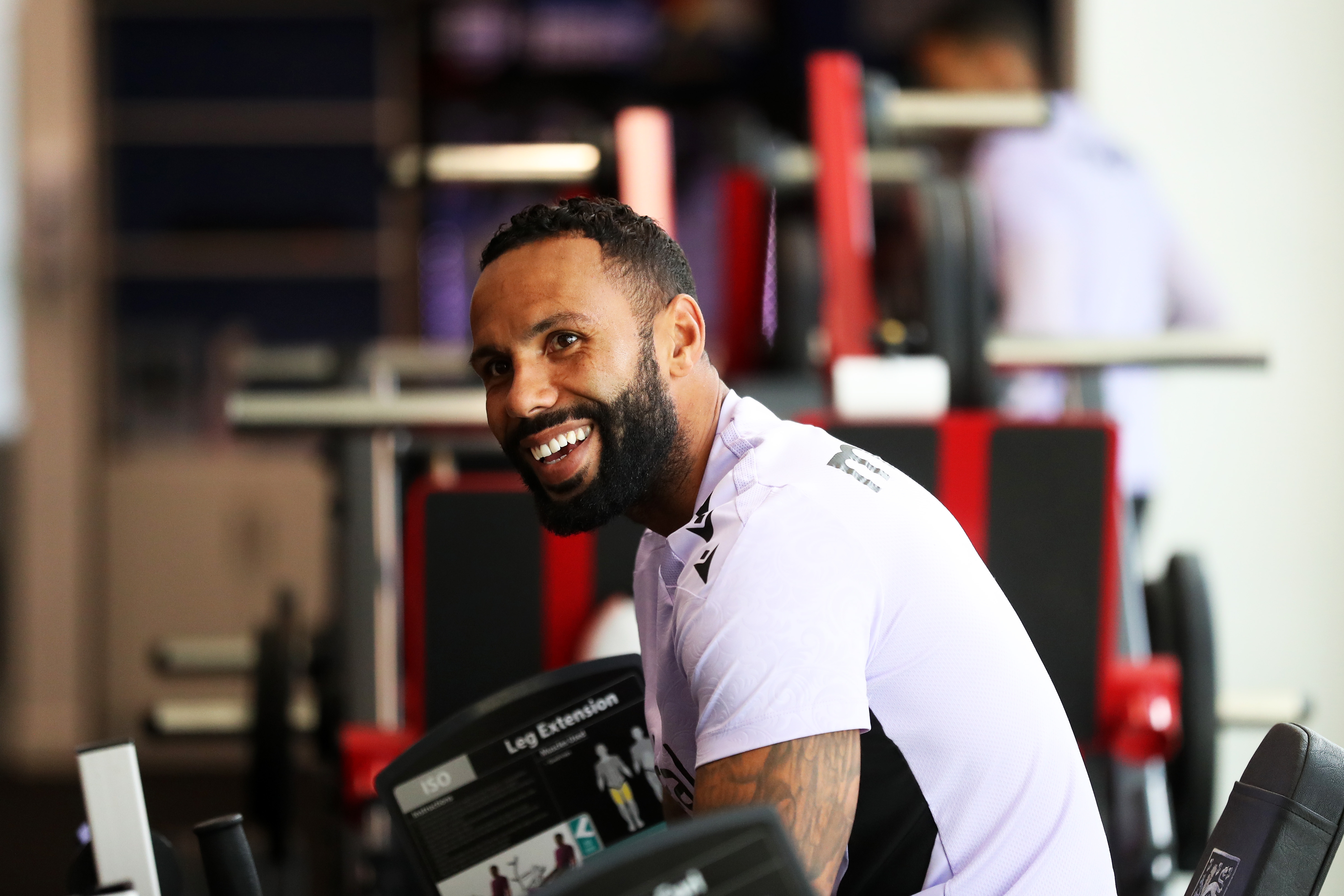 Kyle Bartley smiling in the gym at St. George's Park