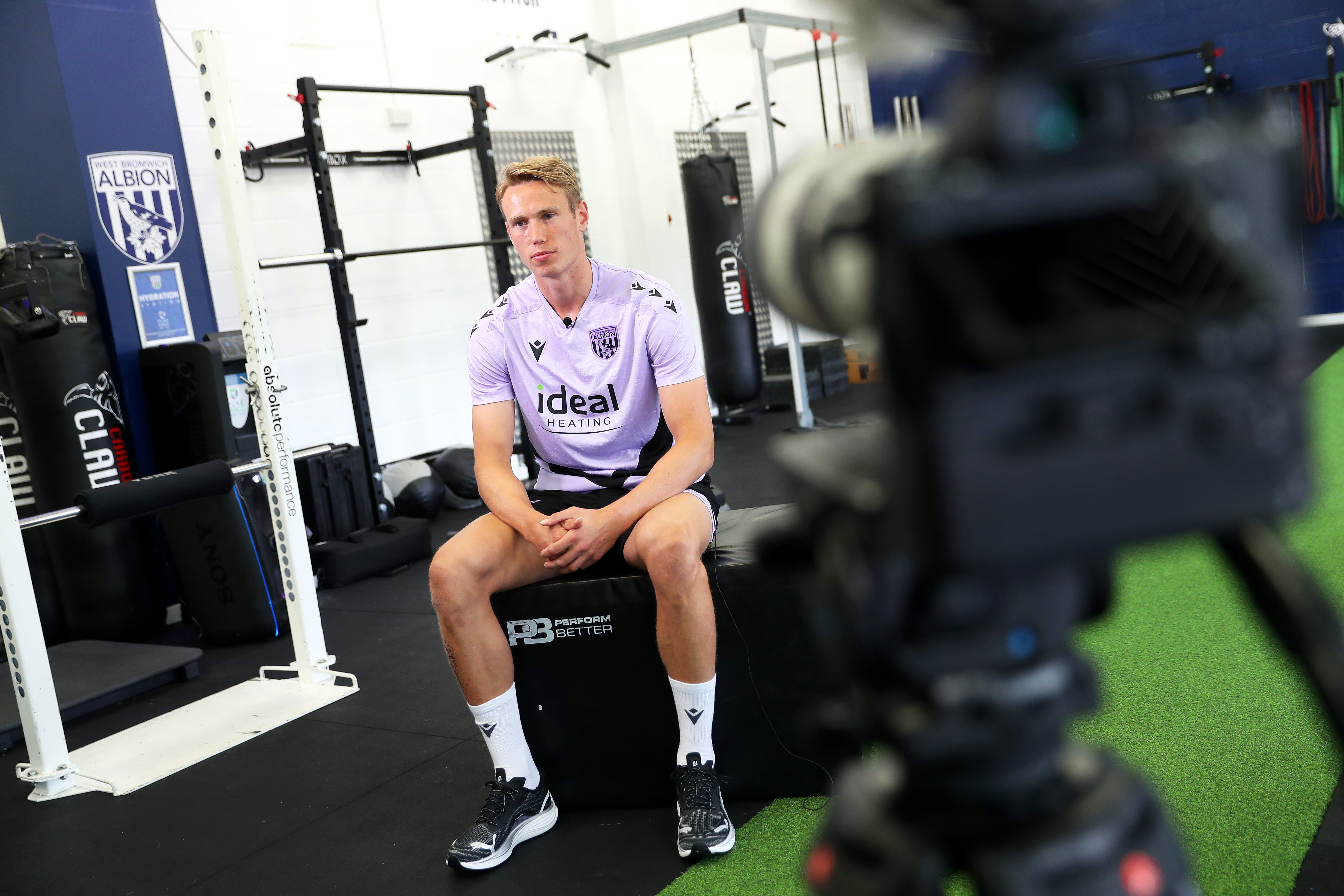 Torbjørn Heggem sat in the gym being interviewed by WBA TV