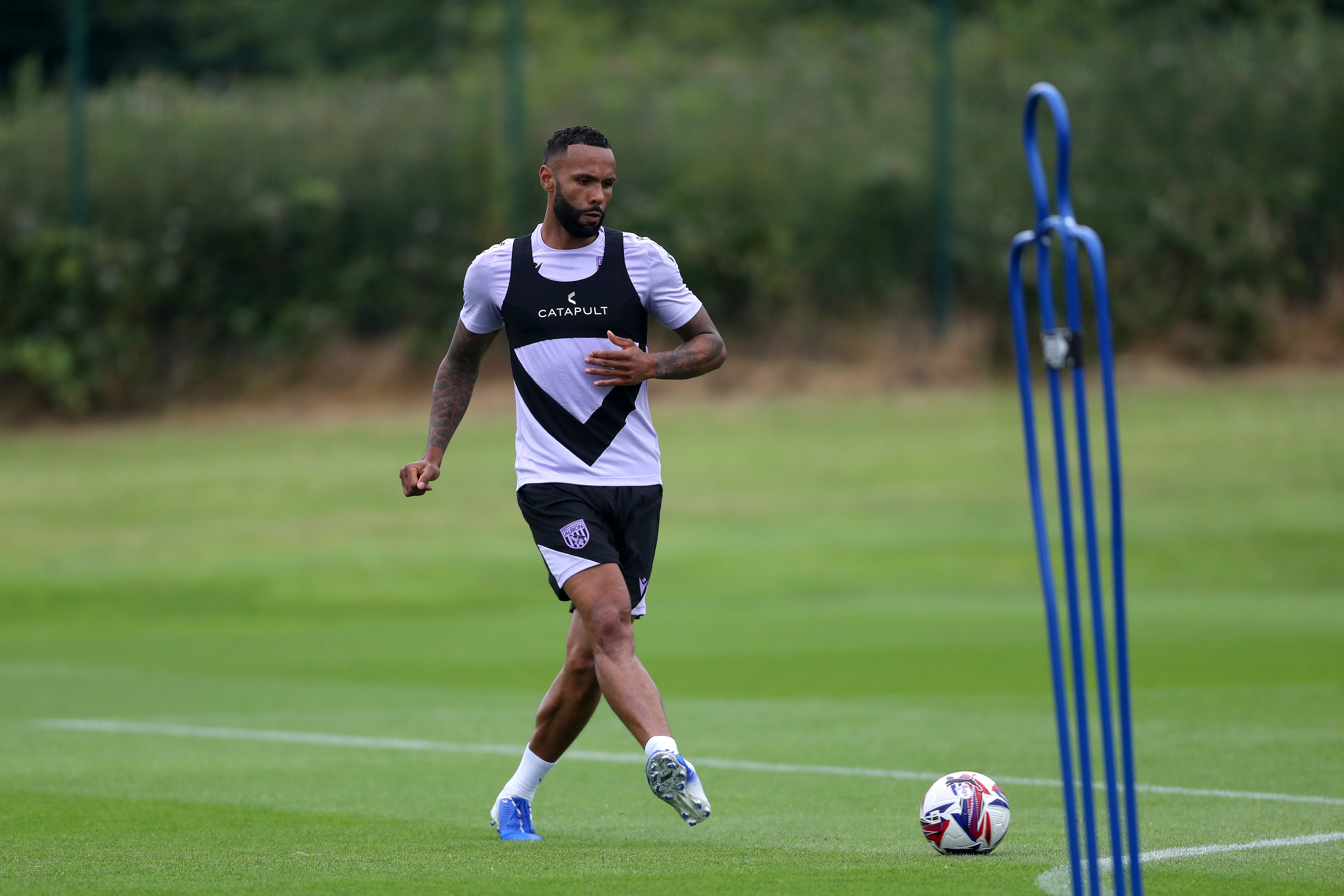 Kyle Bartley passing the ball during a training session