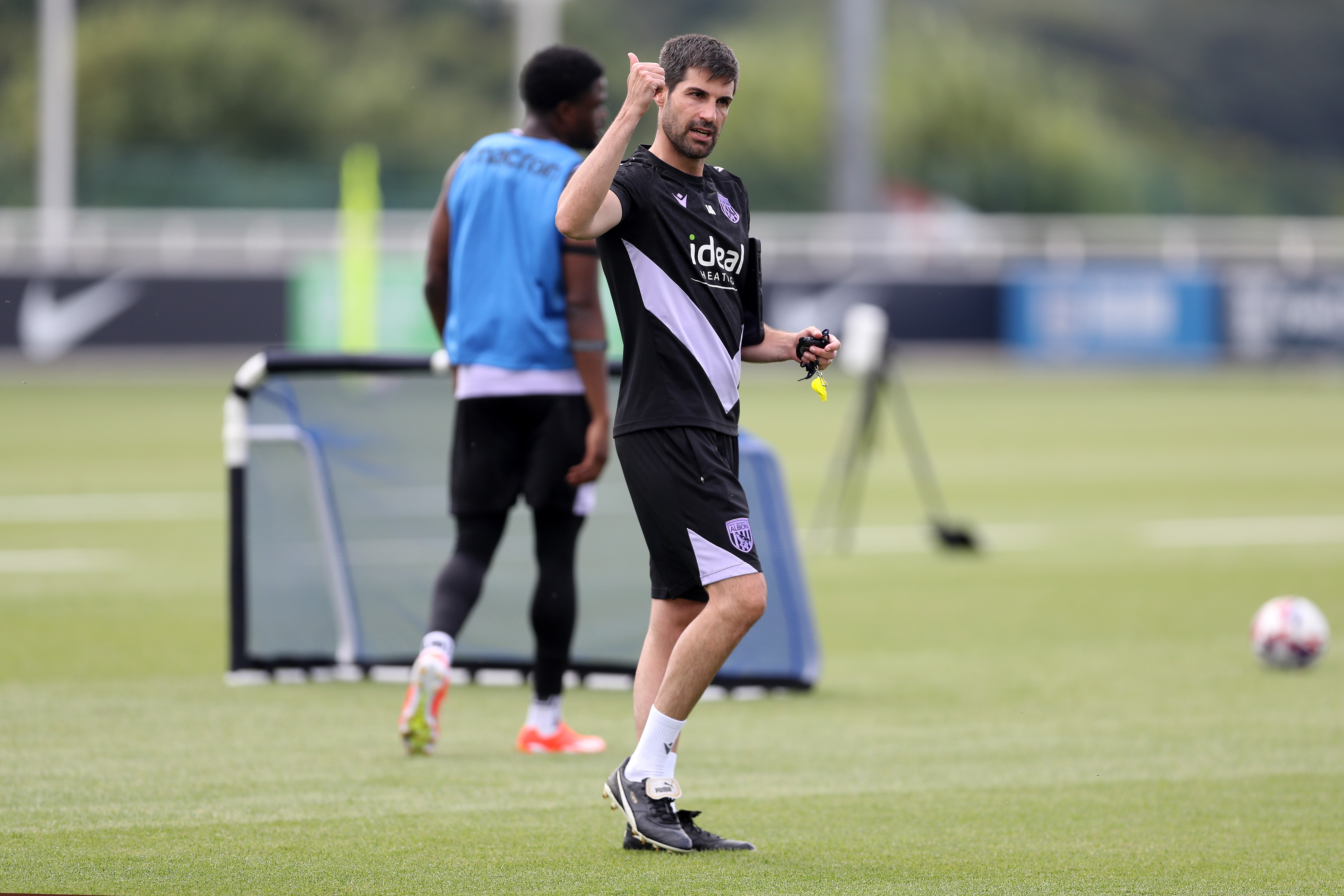 Coach Jorge Alarcon out on the training pitch at St. George's Park