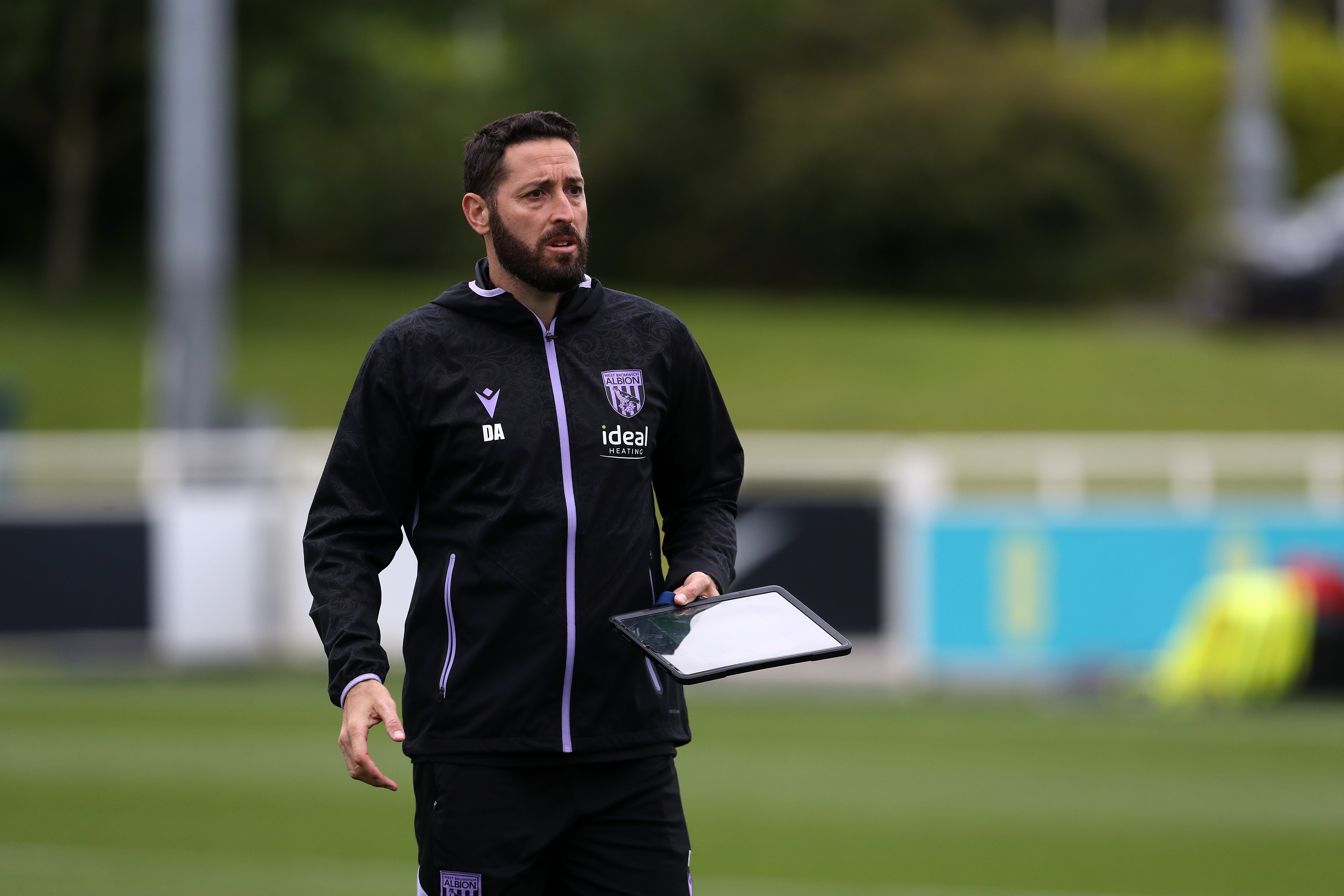 Coach Damia Abella out on the training pitch at St. George's Park