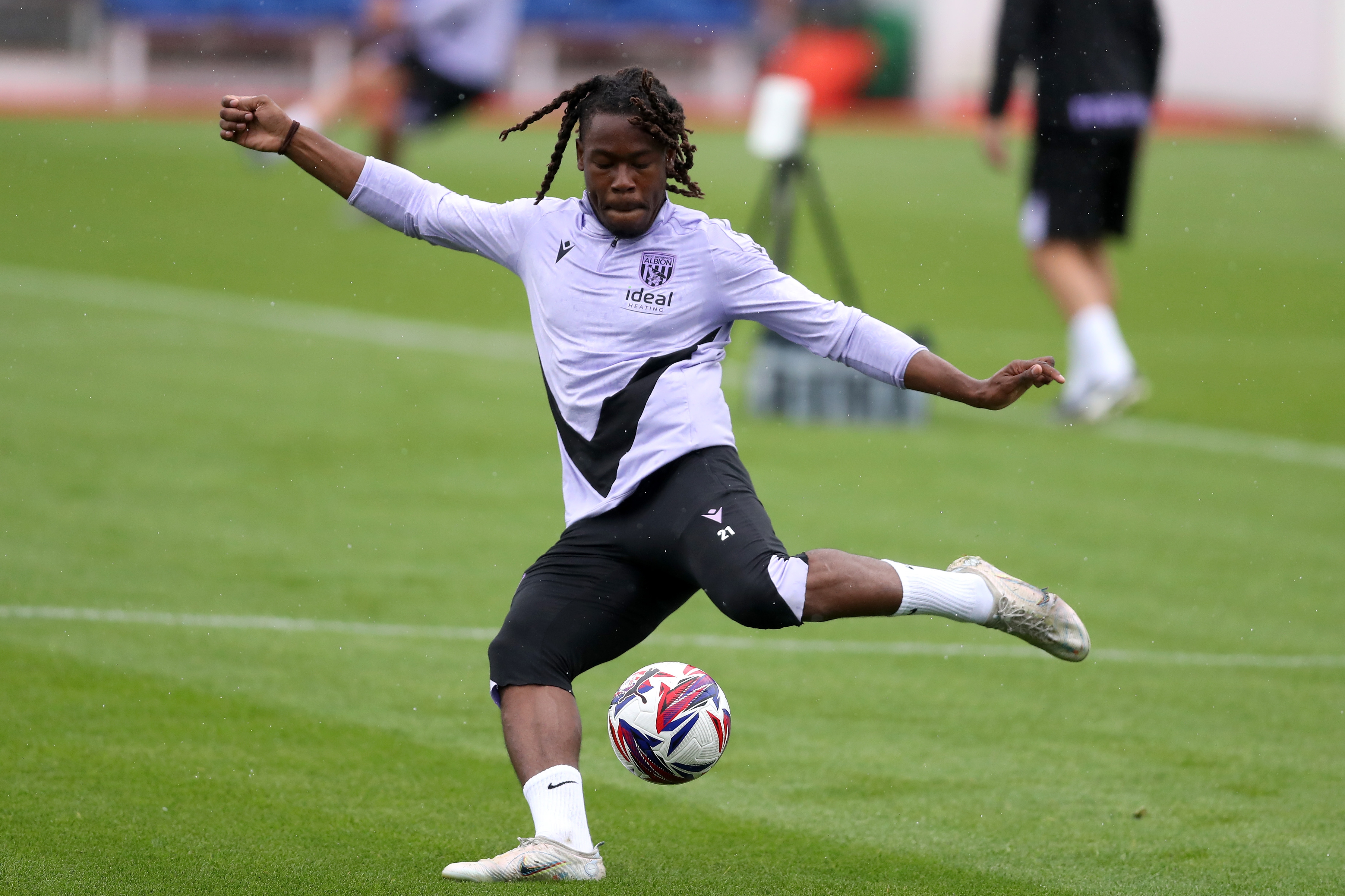 Brandon Thomas-Asante striking the ball during a training session at St. George's Park