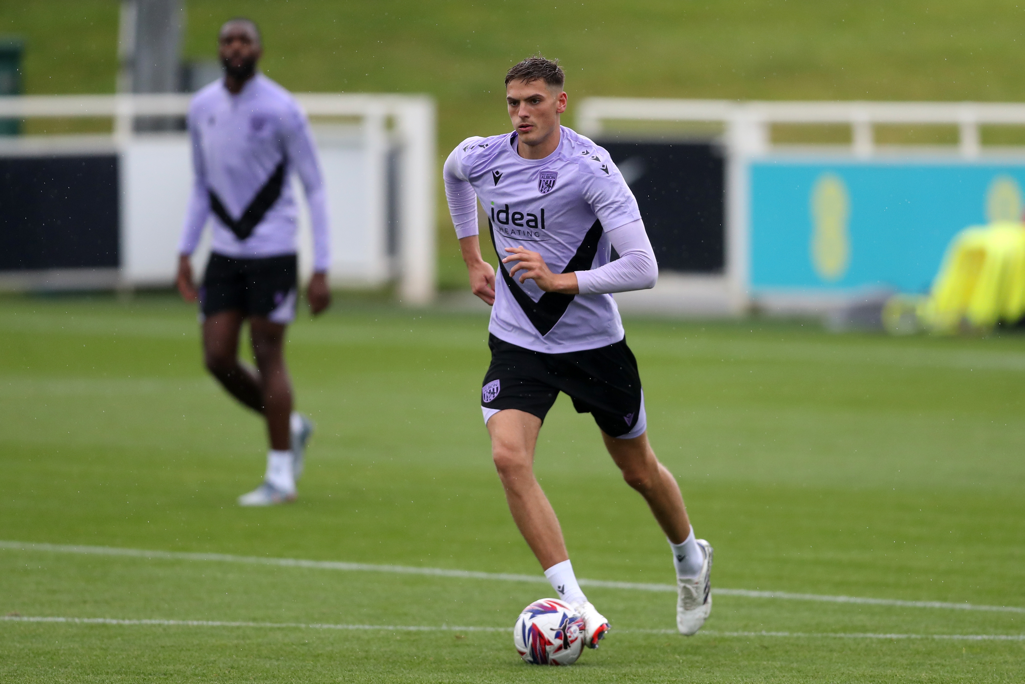 Caleb Taylor on the ball during a training session at St. George's Park