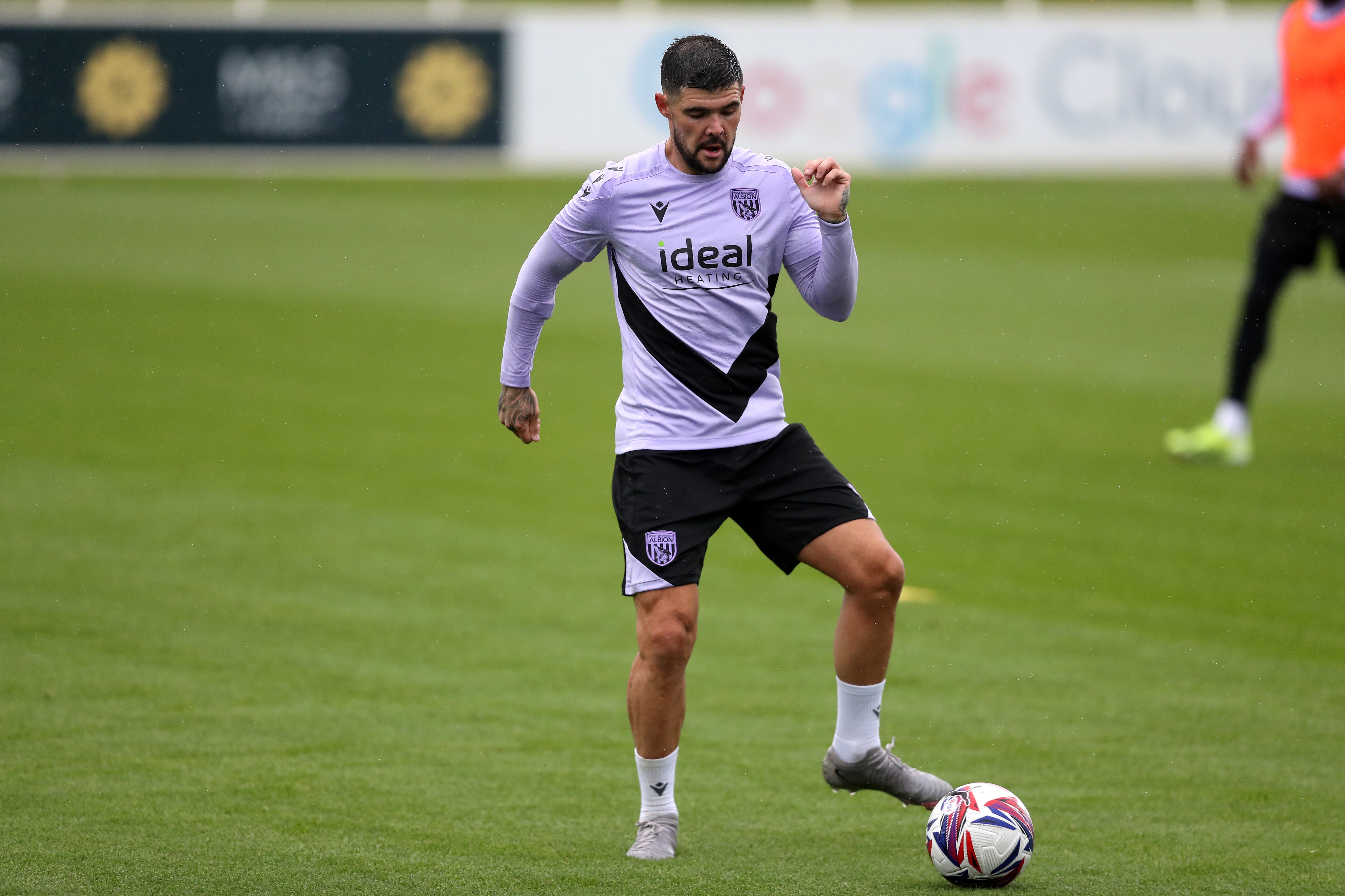 Alex Mowatt on the ball during a training session at St. George's Park