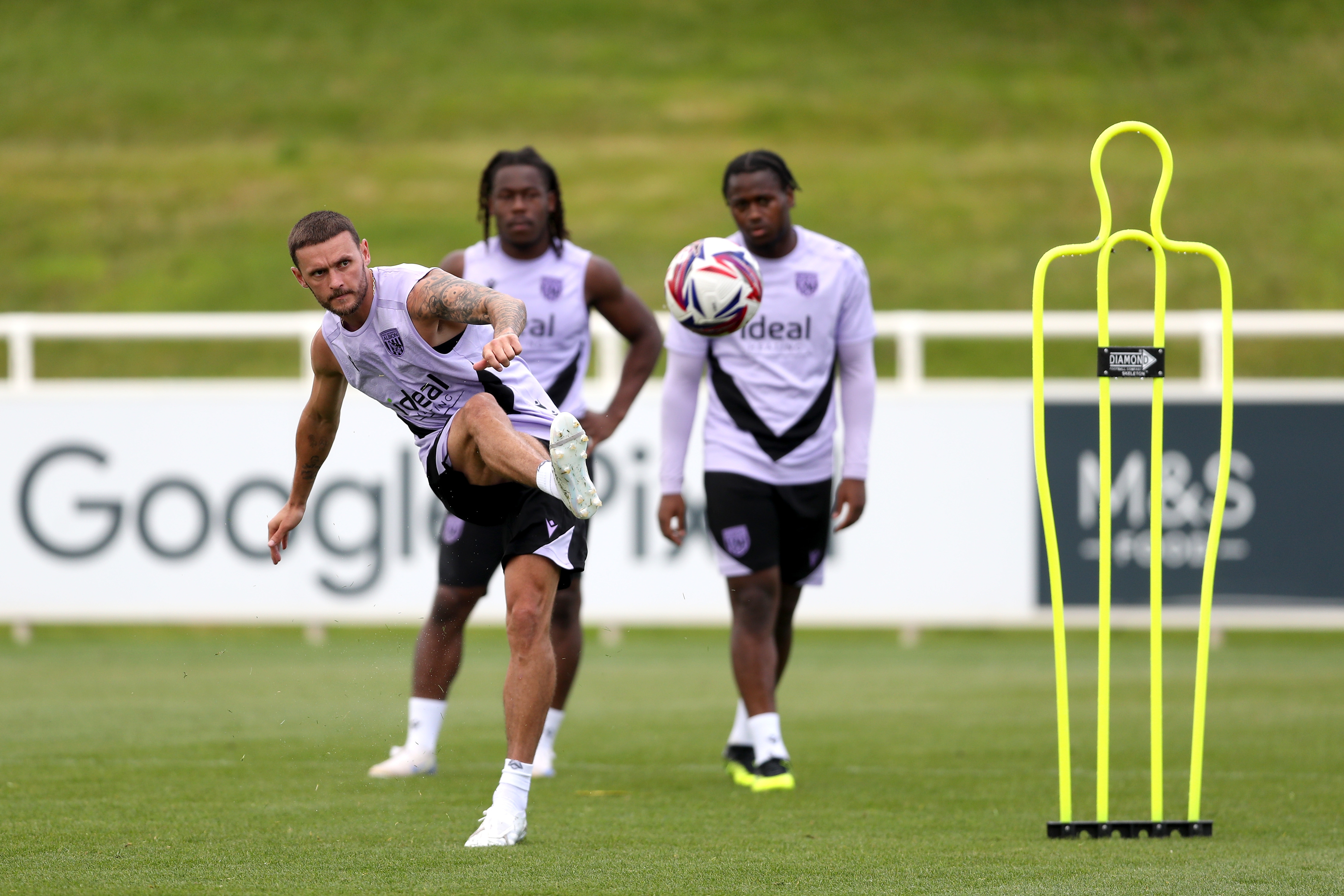 John Swift takes a shot during a training session at St. George's Park