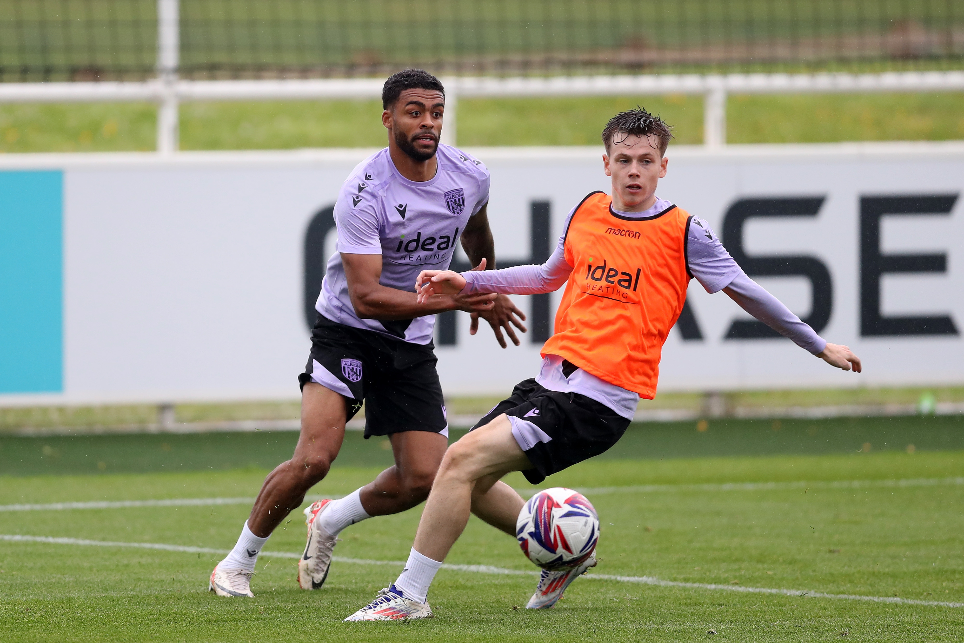 Darnell Furlong and Fenton Heard close to the ball during a training session at St. George's Park