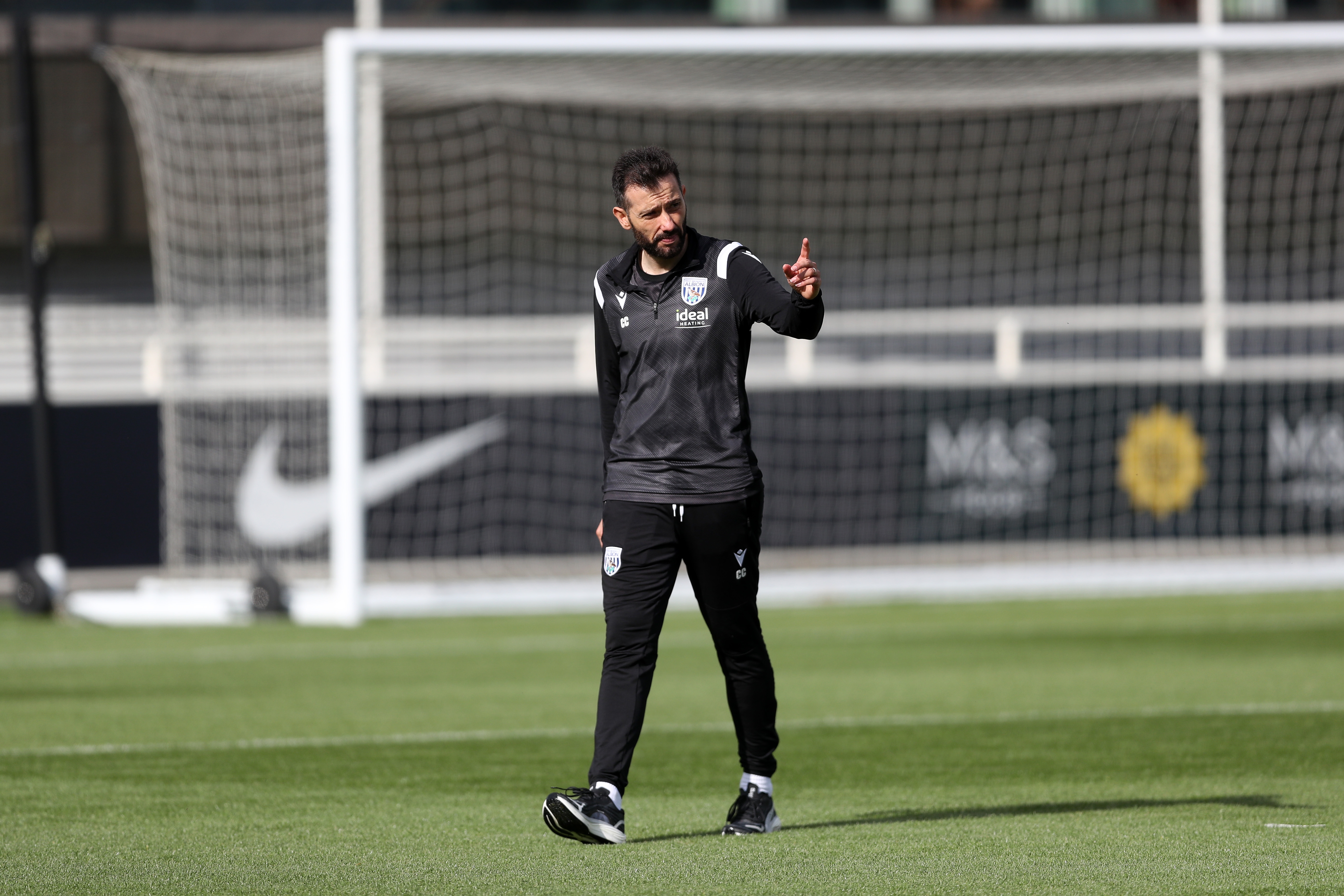 Carlos Corberán out on the training pitch at St. George's Park