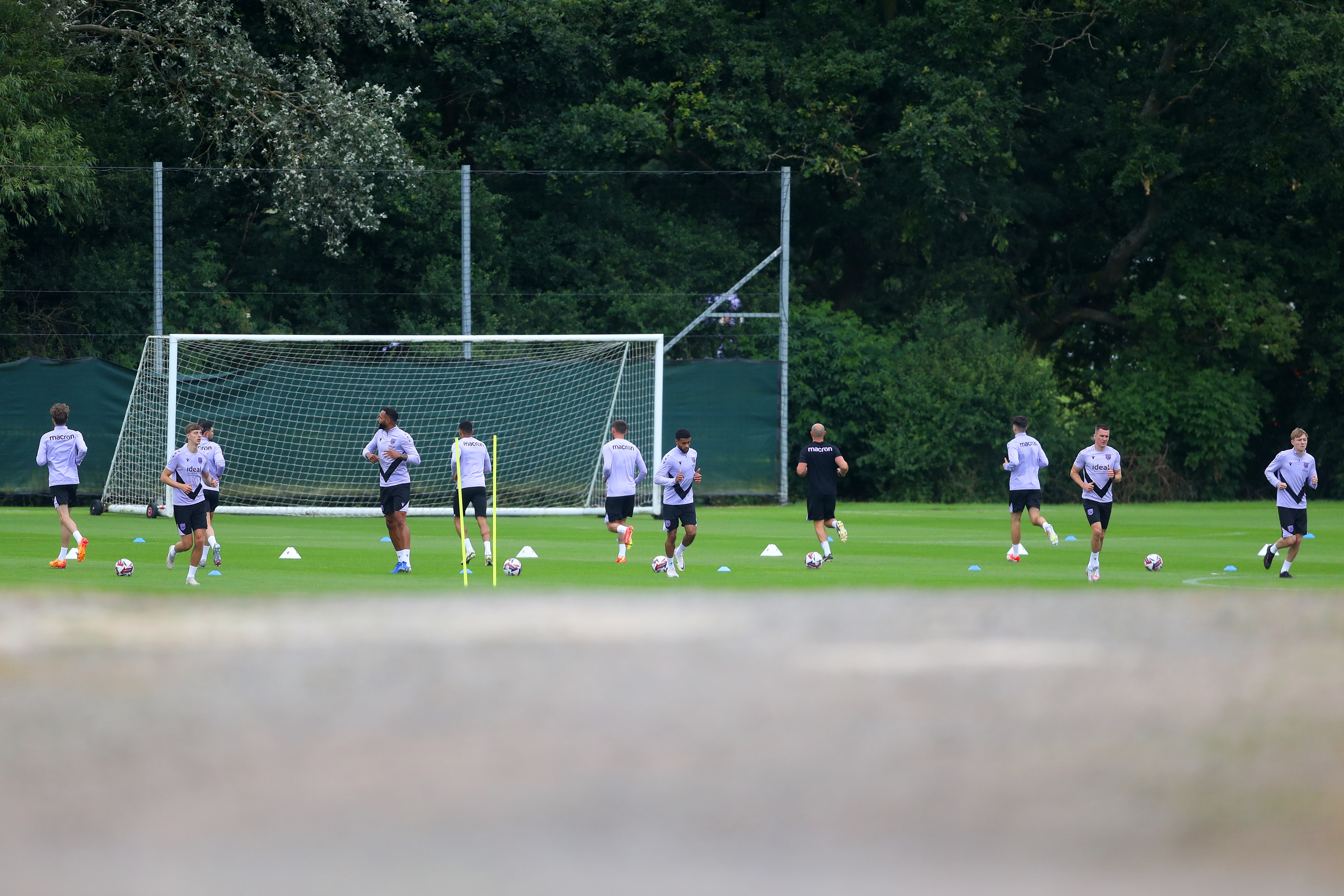 General action of a training session involving several players 