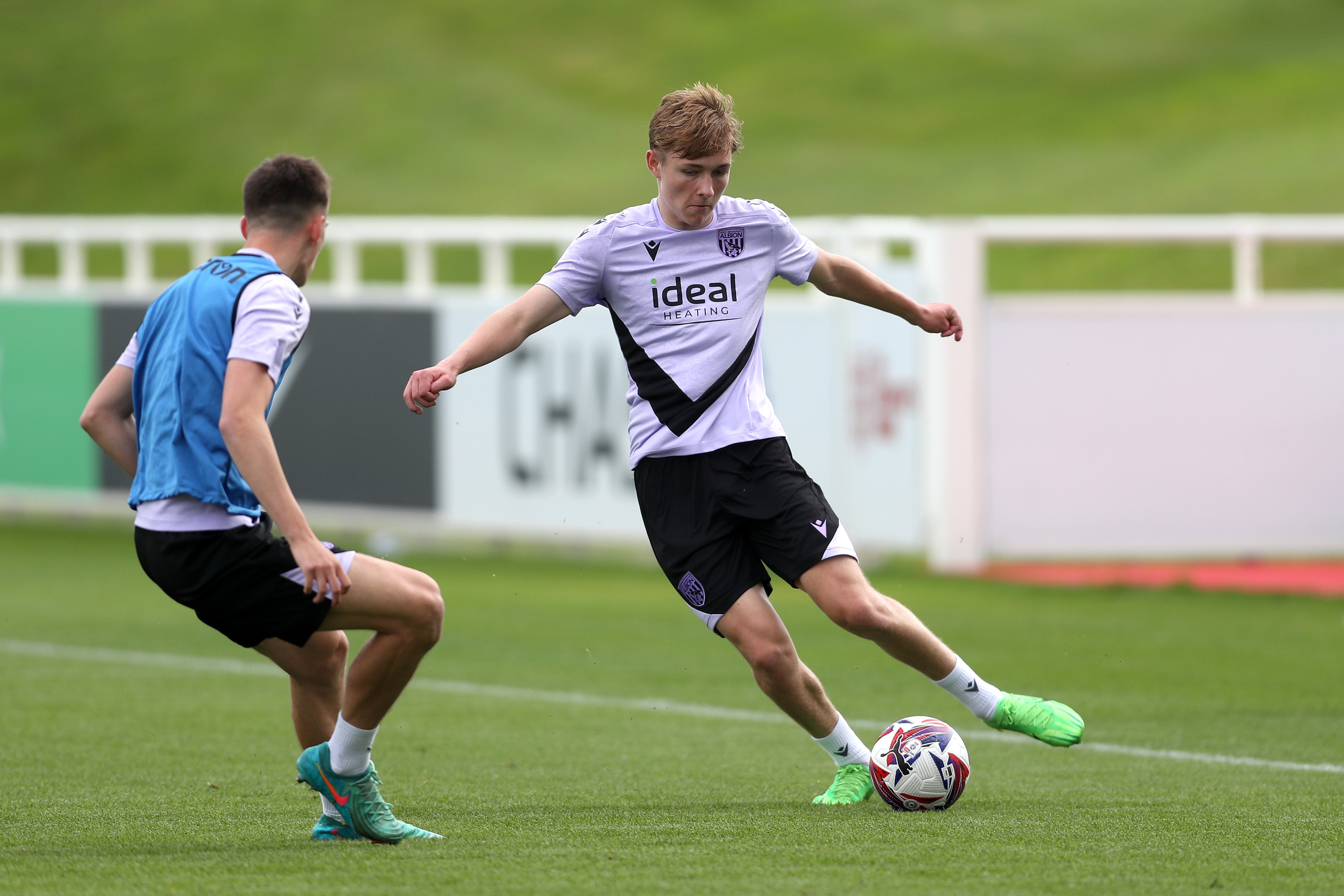 Ollie Bostock on the ball during a training session at St. George's Park