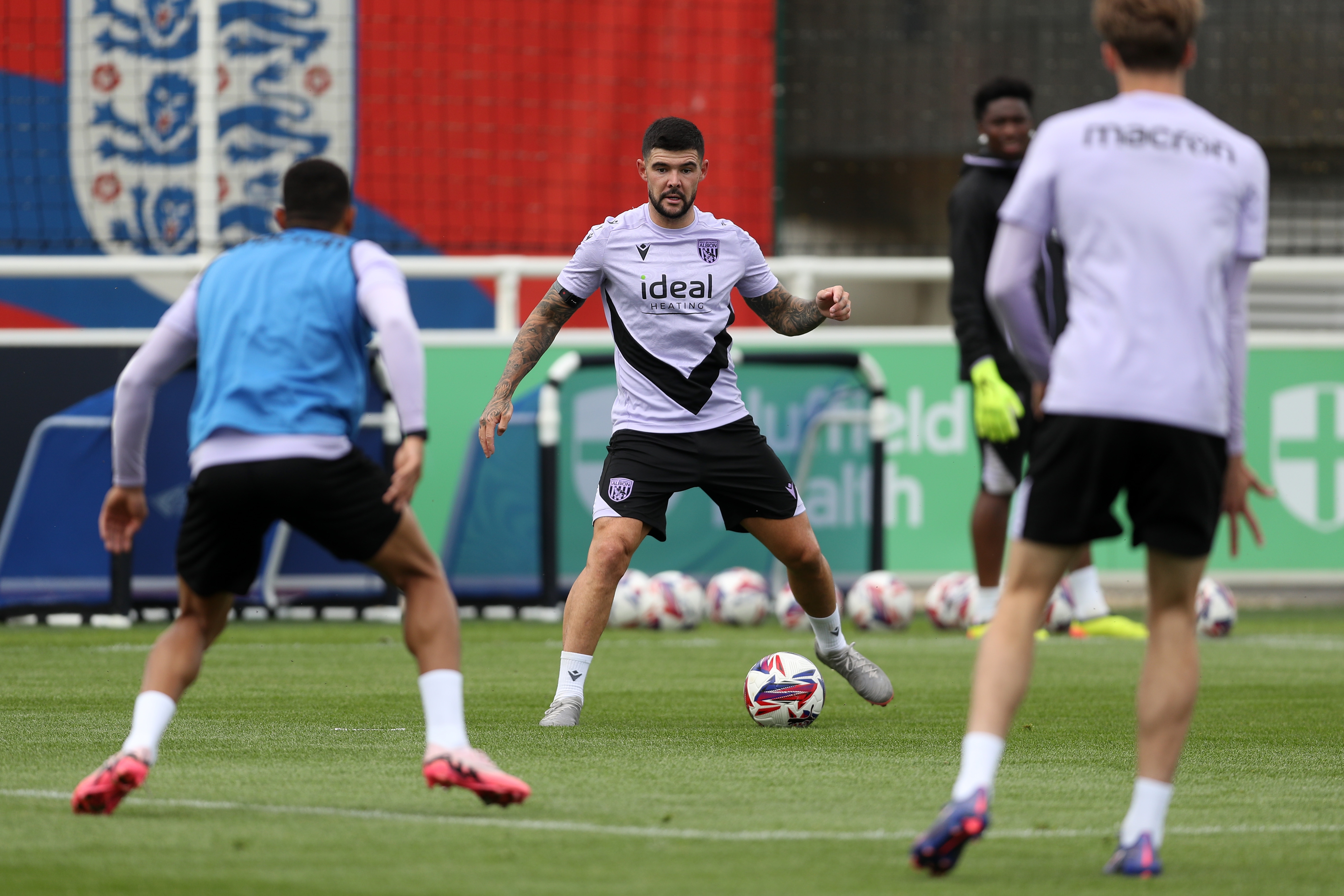 Alex Mowatt on the ball during a training session at St. George's Park