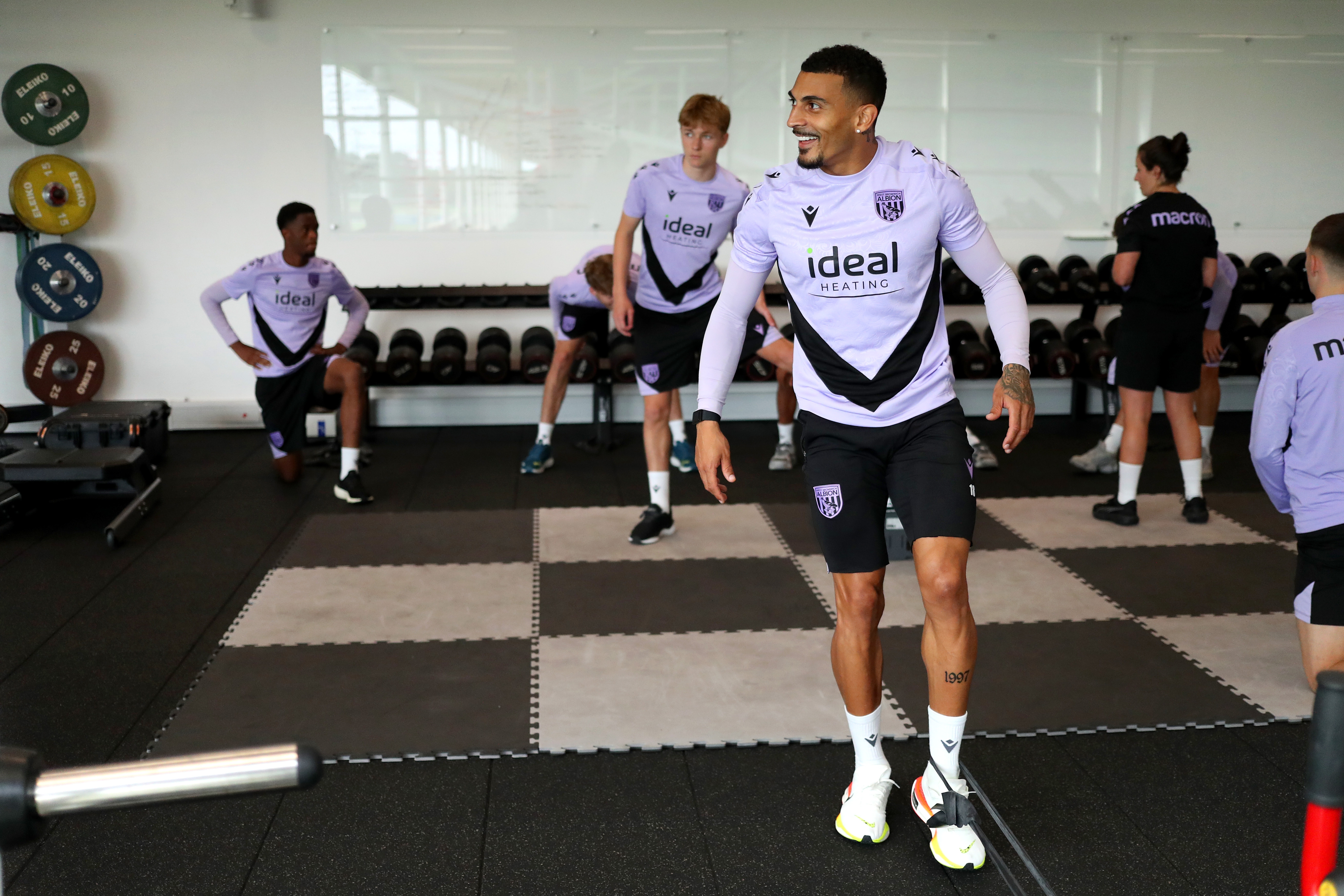 Karlan Grant smiling in the gym at St. George's Park