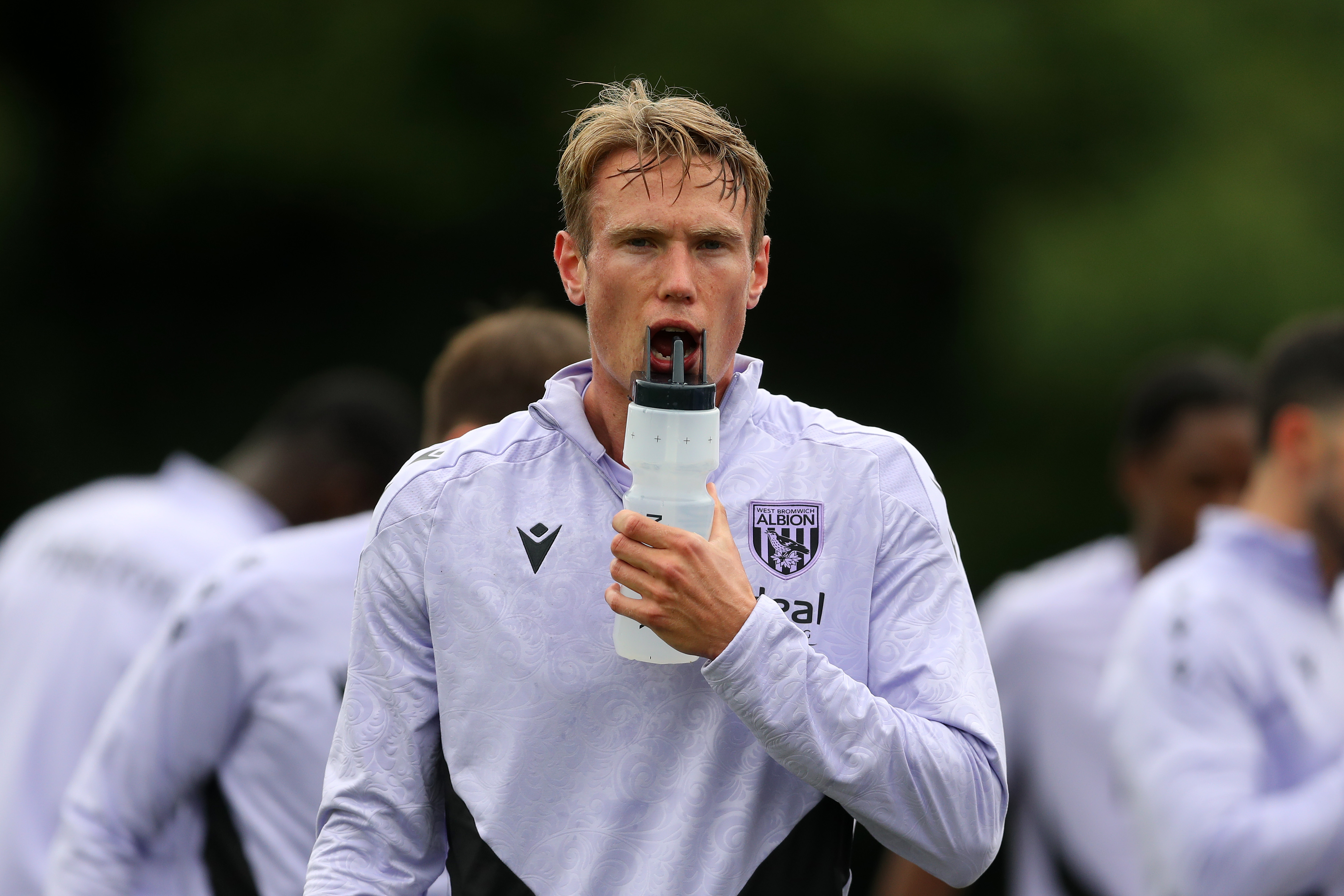 Torbjørn Heggem drinking water during a pause in training 