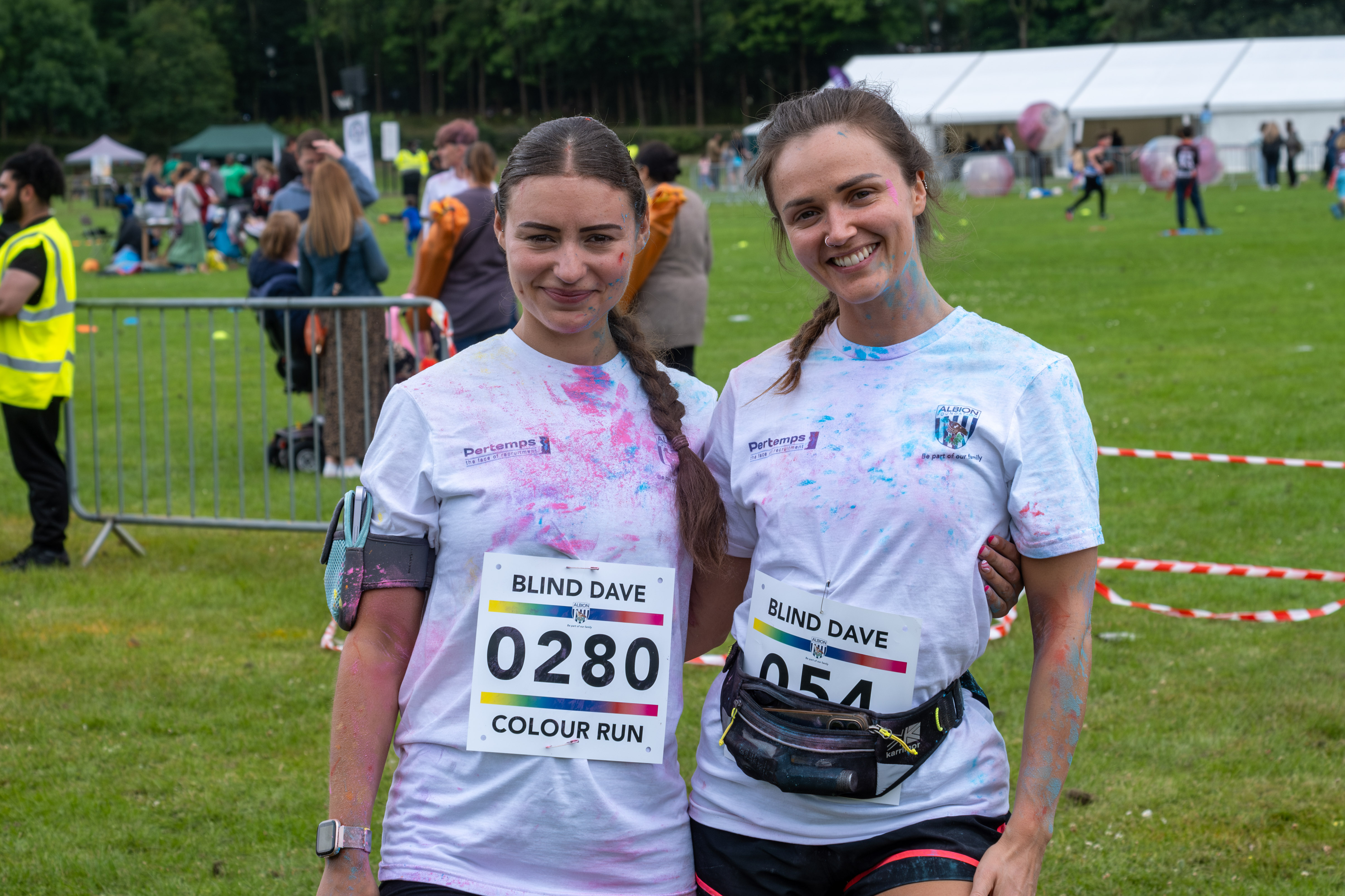 Two female participants pose for photo.